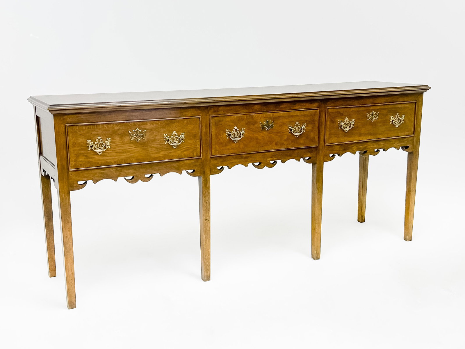 Baker Furniture Collector's Edition Sideboard: Lot 194 Baker Furniture Collector's Edition Sideboard with three drawers and brass hardware, manufacturer's labels to interior drawer 35 1/4 x 79 1/2 x 19 inches Additional Information: central drawer