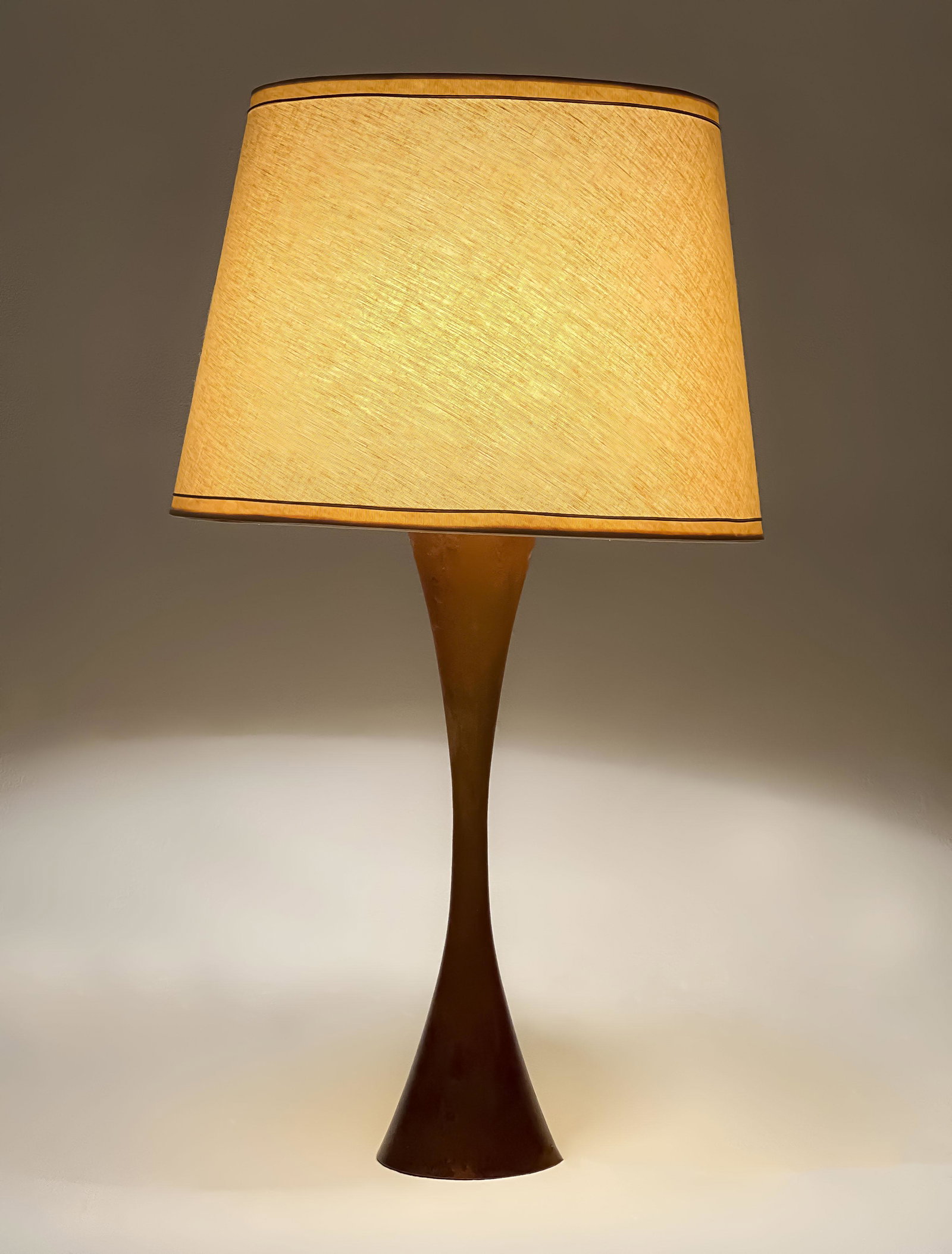 Tall Patinated Metal Table Lamp: Lot 180 Tall Patinated Metal Table Lamp (c. 1960s) the waisted standard with three sockets, stamped ”JAPAN” to underside height overall: 32 1/2 inches Provenance: From a Cape Cod collectio