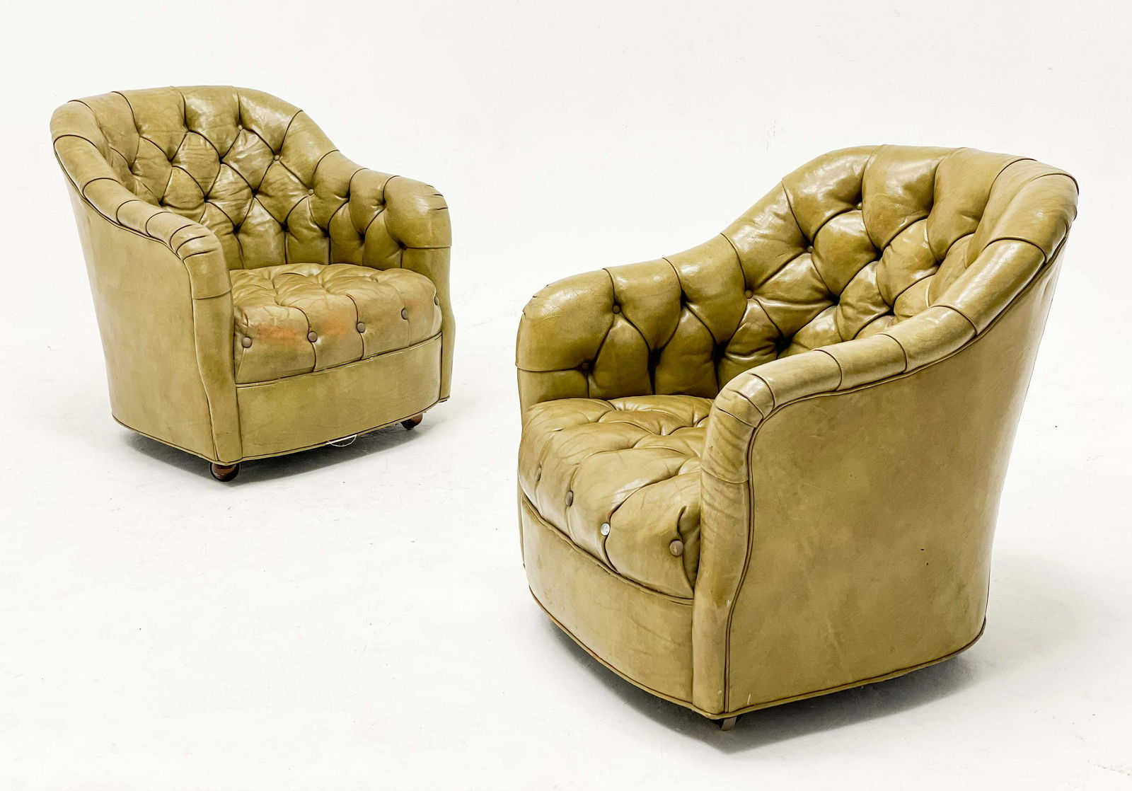 Ward Bennett - Pair of Club Chairs,: Lot 236 Ward Bennett American (1917-2003) Pair of Club Chairs, (c. 1970) tufted leather, raised on casters each: 29 1/2 x 27 x 28 inches Provenance: From a Private New York collection Furniture / Larg
