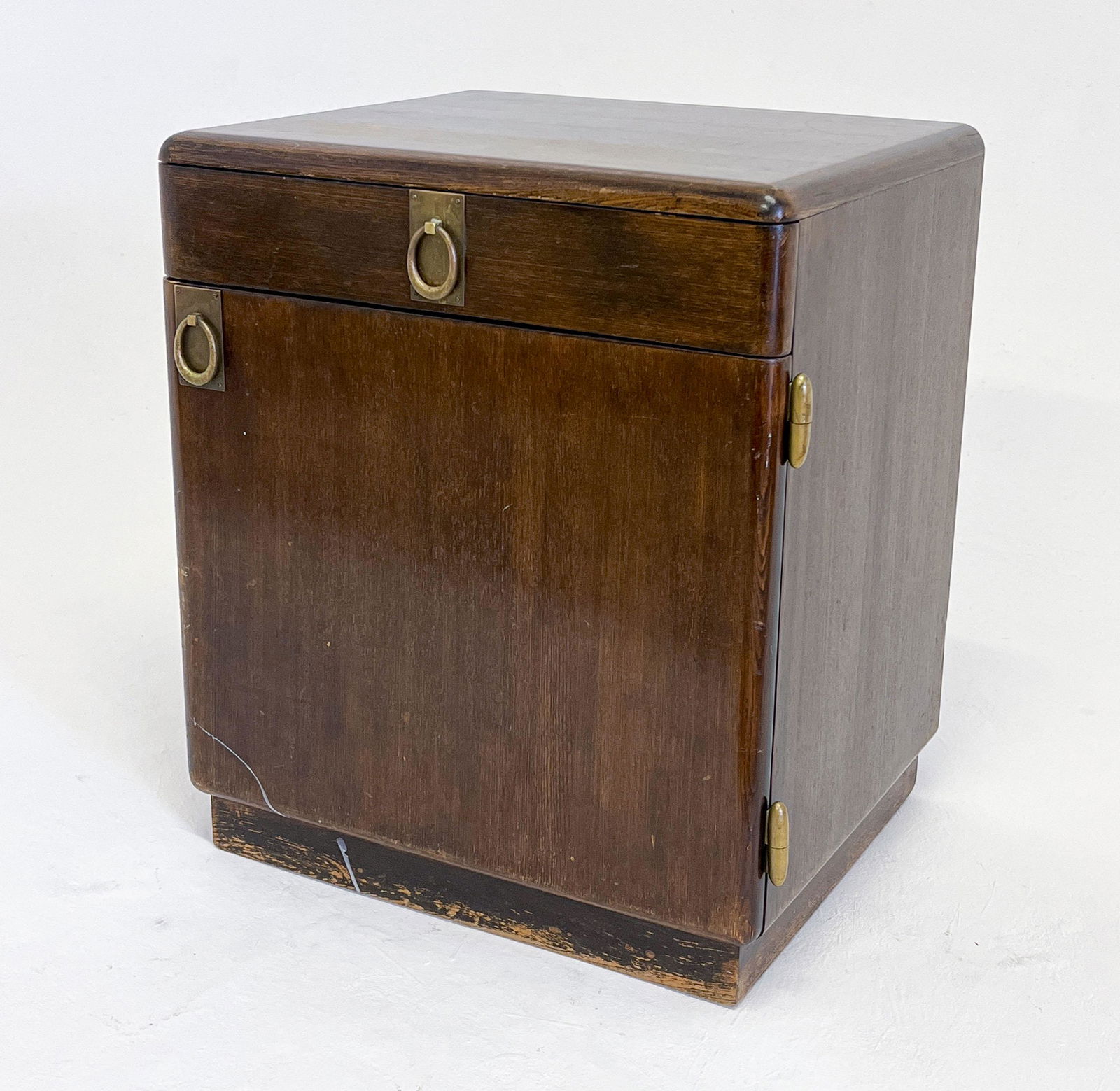 Seccessionist Wood Cabinet: Lot 146 Seccessionist Wood Cabinet attributed to Adolf Loos (Austrian, 1870-1933), of curvilinear form, having single drawer over single door cupboard and brass fittings (one marked D.R.G.M.), raised