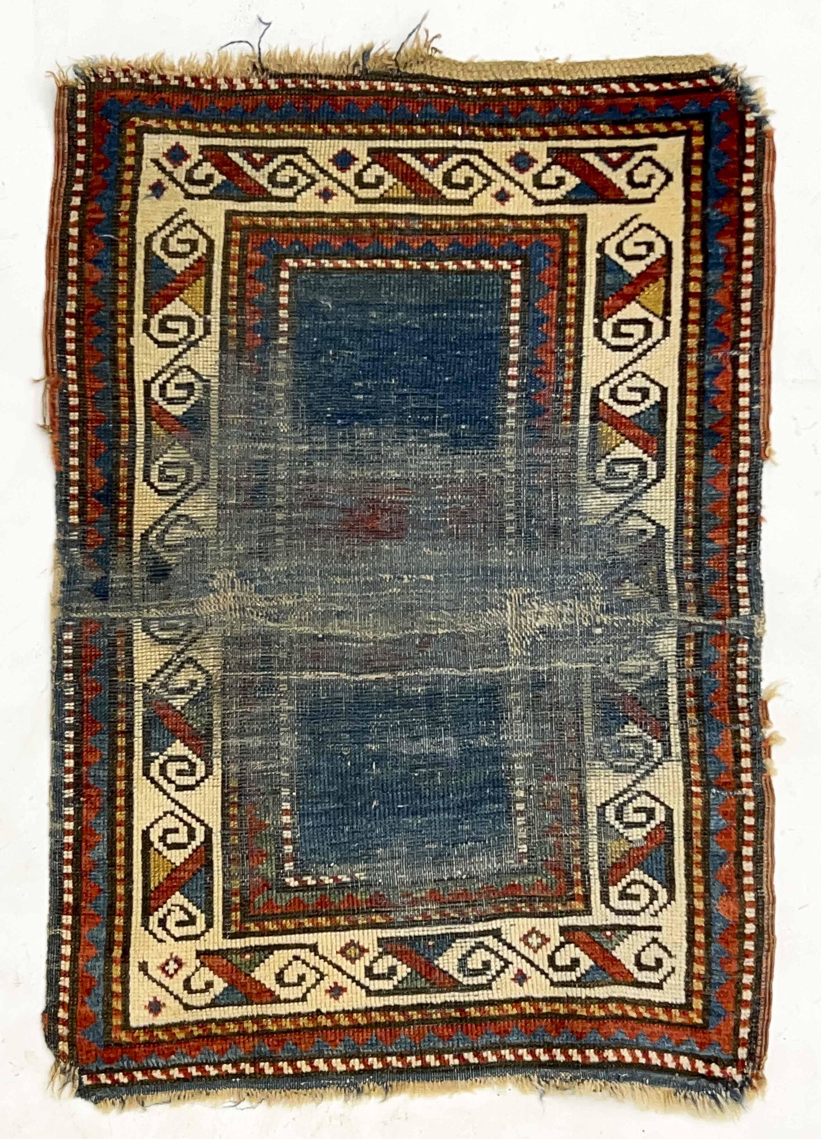 Kazak Rug: Lot 5 Kazak Rug Southwest Caucasus c. 1900 3 ft 1 1/2 in x 2 ft 2 in Provenance: Jim Dixon Collection