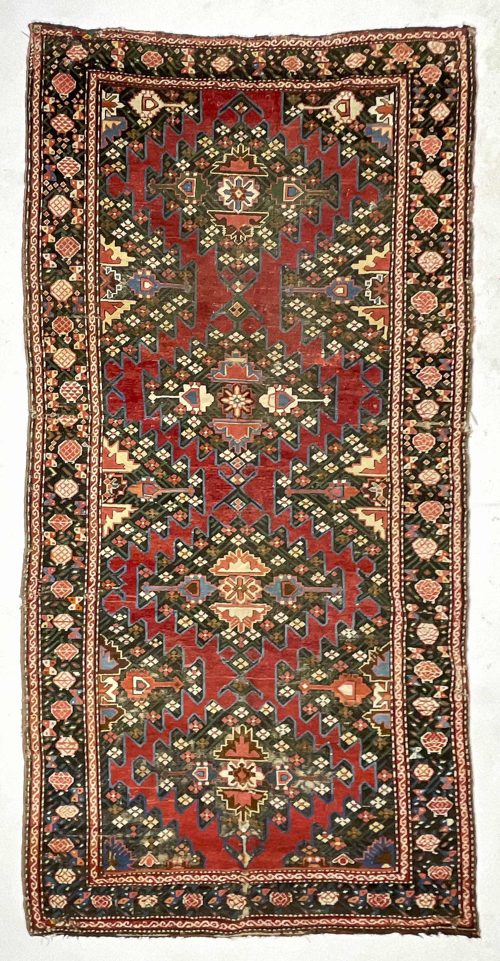 Karabagh Rug: Lot 19 Karabagh Rug Southwest Caucasus last quarter of 19th century 10 ft x 4 ft 9 in Provenance: Jim Dixon Collection