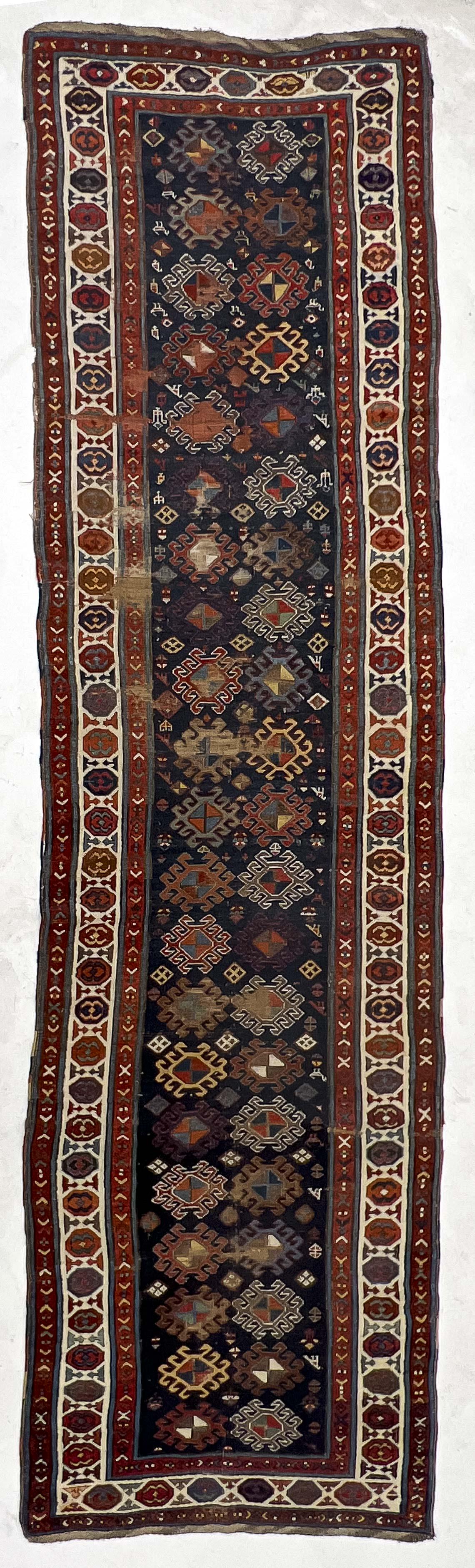 Gendje Runner: Lot 45 Gendje Runner Southwest Caucasus last quarter of 19th century 11 ft 8 in x 3 ft 2 in Provenance: Jim Dixon Collection