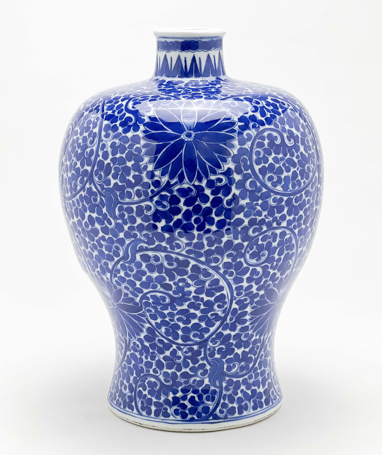 Chinese Porcelain Underglaze Blue Decorated Meiping Vase: Lot 75 Chinese Porcelain Underglaze Blue Decorated Meiping Vase decorated with lotus flowers on scrolling foliate ground height: 12 1/4 inches diameter: 8 3/8 inches Provenance: From a Private New Yor