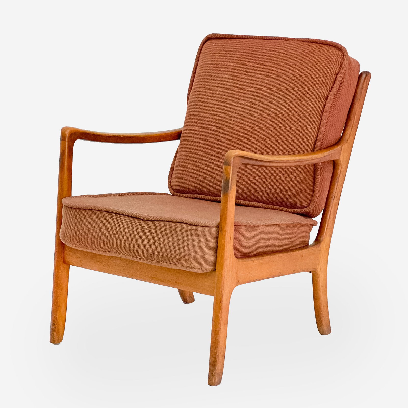 Mid Century Danish Lounge Chair: Lot 150 Mid Century Danish Lounge Chair open arm chair, upholstered in red fabric, with wooden frame and splayed legs 32 x 25 x 30 inches seat height: 17 1/2 inches Provenance: From the Estate of Toma