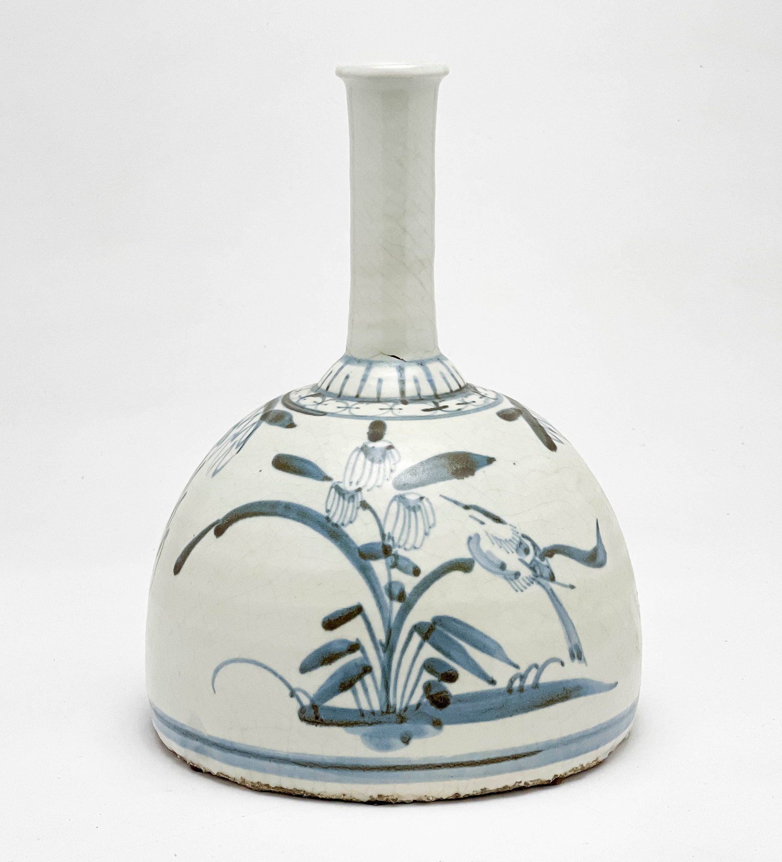 Korean Blue and White Bottle Vase: Lot 157 Korean Blue and White Bottle Vase (19th/20th Century) height: 9 1/2 inches diameter: 6 1/2 inches Provenance: From an East Hampton Collection