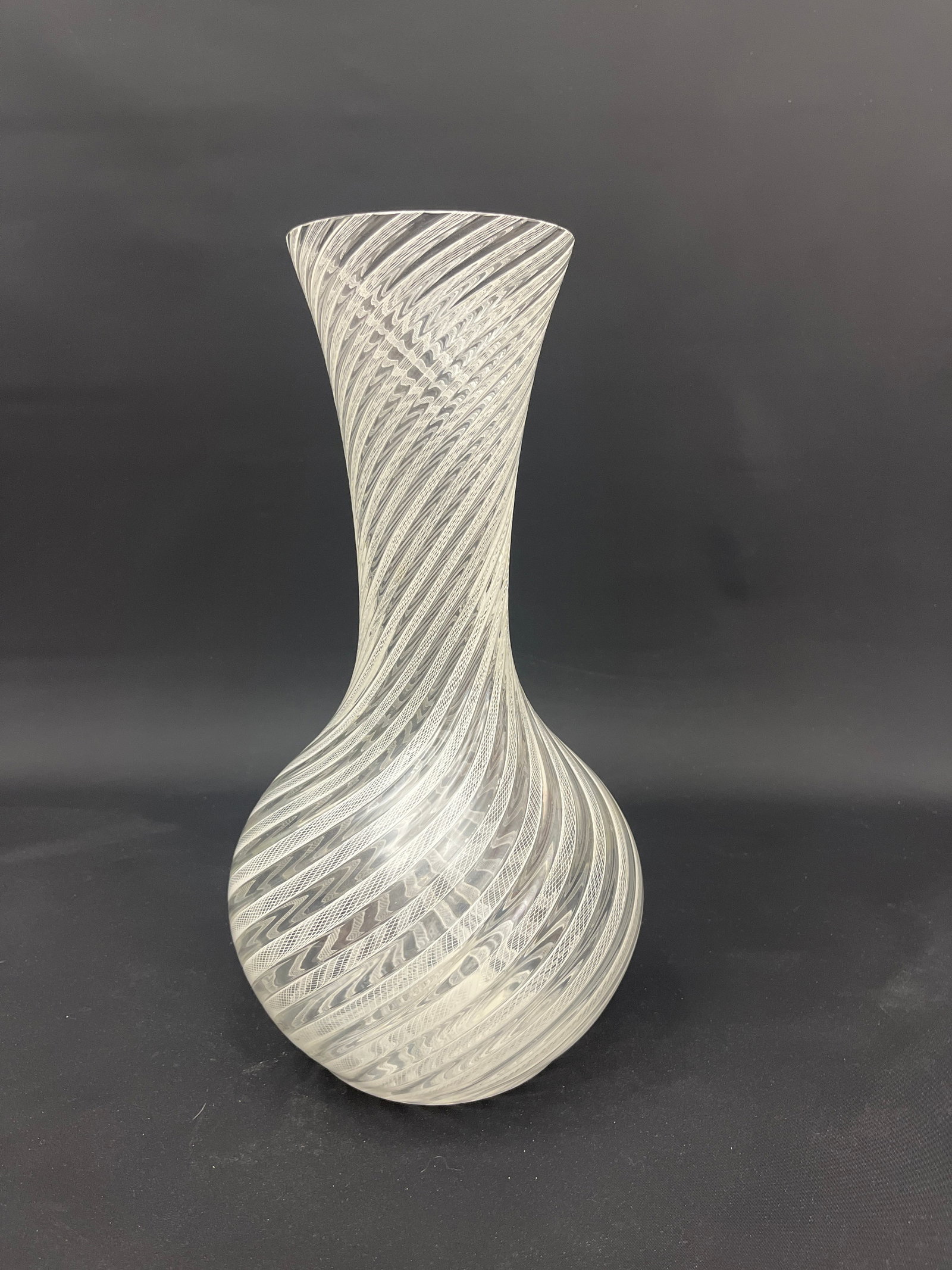 Italian Murano Latticino Filigrana Glass Vase: Lot 201 Italian Murano Latticino Filigrana Glass Vase height: 15 1/8 inches Provenance: From a Private New York Collection