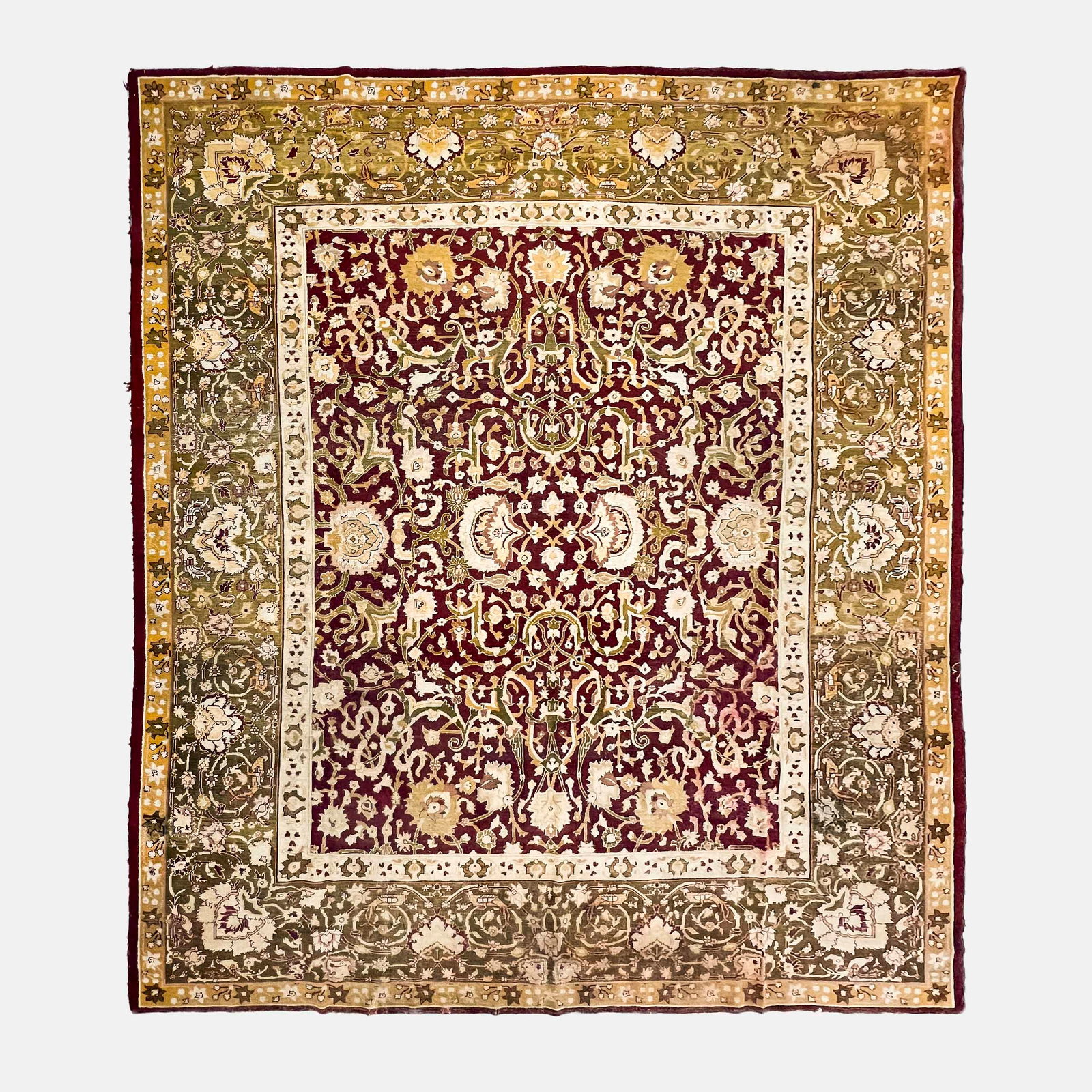 Antique Agra Rug: Lot 147 Antique Agra Rug red ground, with green and tan border, with floral motifs 9 ft 12 in x 10 ft 11 1/2 Additional Information: re-offer due to nonpaying bidder Manning Whitby