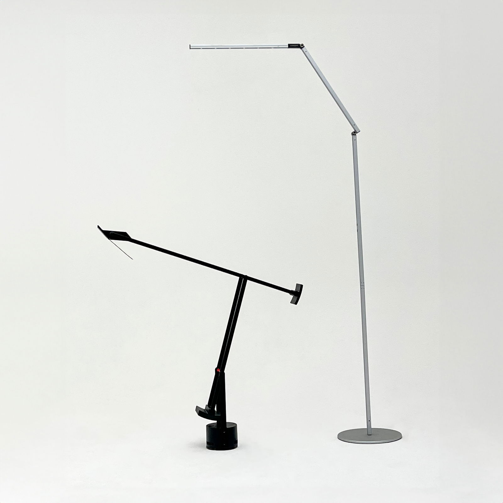 Richard Sapper - Adjustable Floor Lamps, Group of 2: Lot 142 Richard Sapper German (1932-2015) Adjustable Floor Lamps, Group of 2 height (taller): 74 inches Additional Information: lot also comes with a Koncept floor lamp Provenance: The Estate of Rober