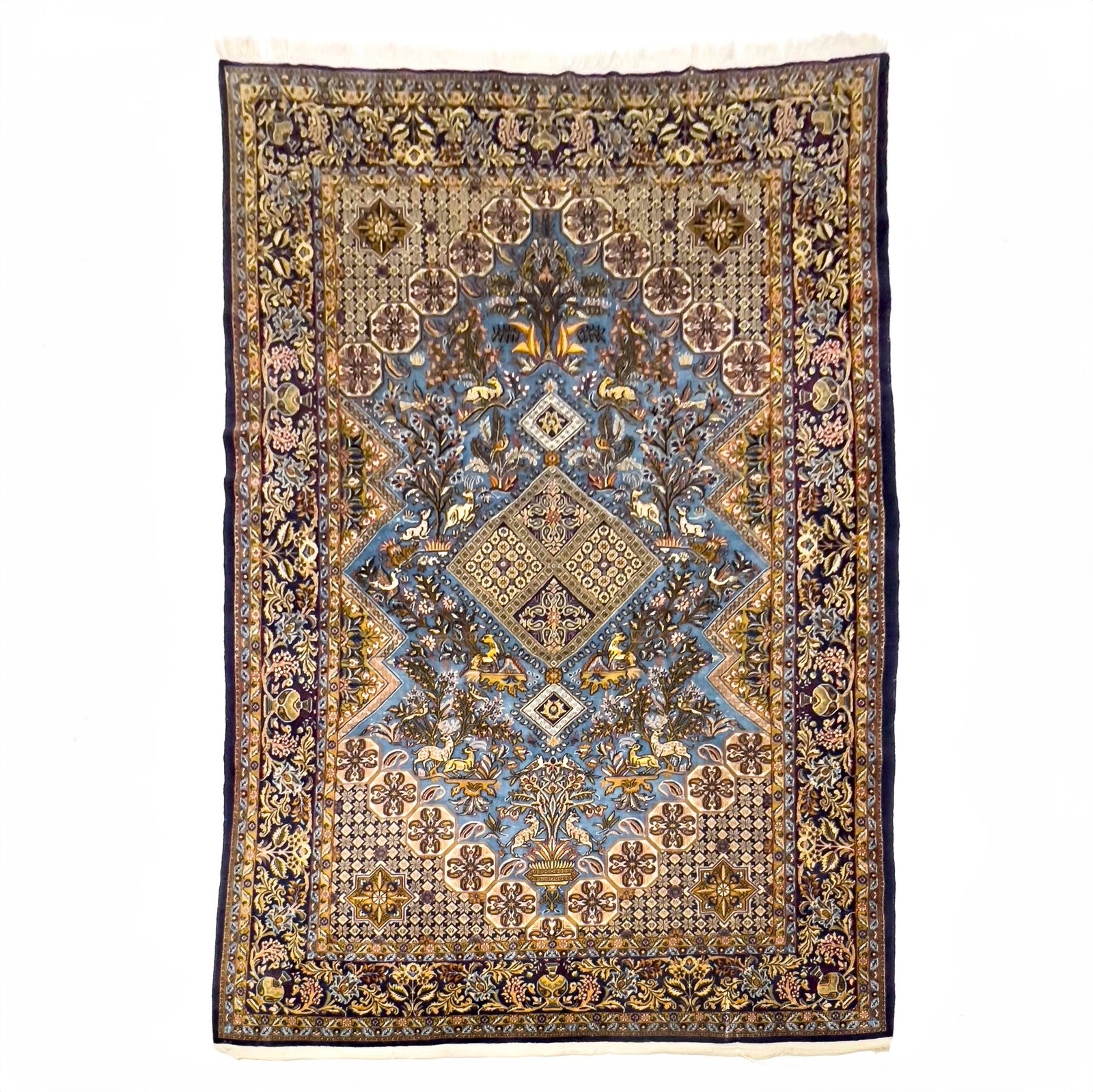 Persian Rug: Lot 68 Persian Rug blue ground with floral elements and central medallion 10 ft 11 in x 7 ft 5 in Provenance: From the Estate of Linda R. Hirshman