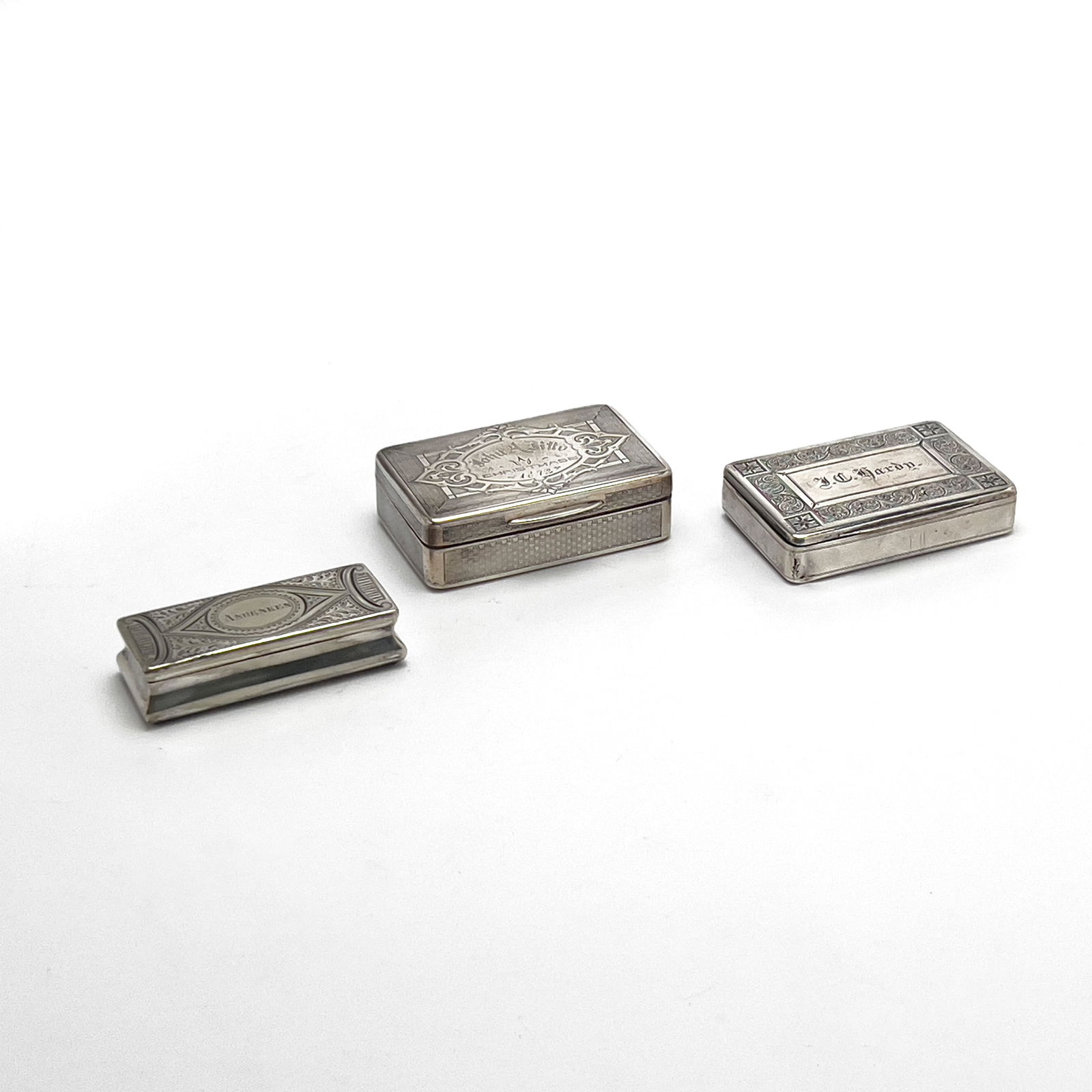 Antique Silver Snuff Boxes, Group of 3: Lot 44 Antique Silver Snuff Boxes, Group of 3 Comprising American silver snuff box engraved ”John A. Ditto Christmas 1872”, Duhme & Co. American silver snuff box engraved ”JC Hardy&