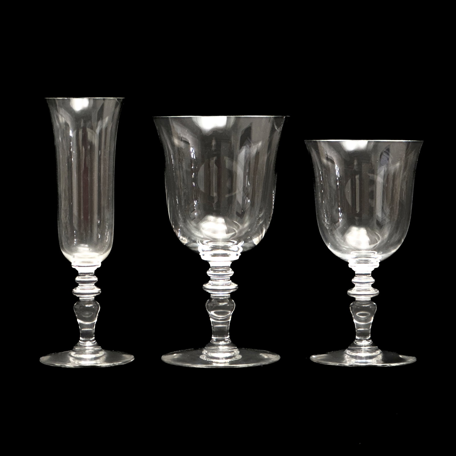 Baccarat - Provence Stemware, Group of 20: Lot 82 Baccarat French Manufacturer (est. 1764) Provence Stemware, Group of 20 crystal Comprising 15 champagne flutes, 4 large wine glass, and 1 small wine glass acid etched logo to undersides champag