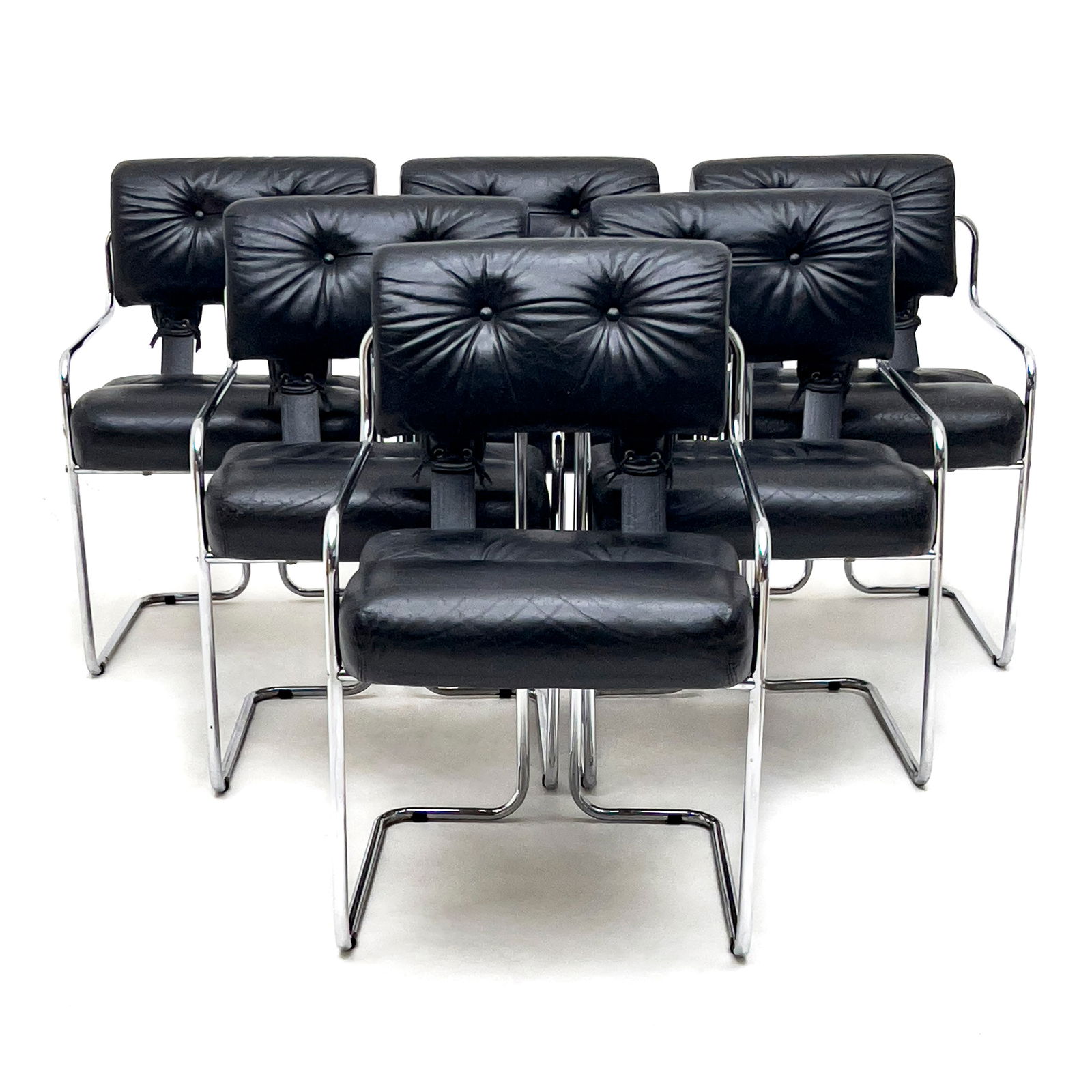 Guido Faleschini - Tucroma Chairs for Mariani, Set of 6: Lot 242 Guido Faleschini Italian (1924-1971) Tucroma Chairs for Mariani, Set of 6 chrome and leather Set of 6 Leather Tucroma chairs, chrome steel tubular frames and button tufted black leather. i4