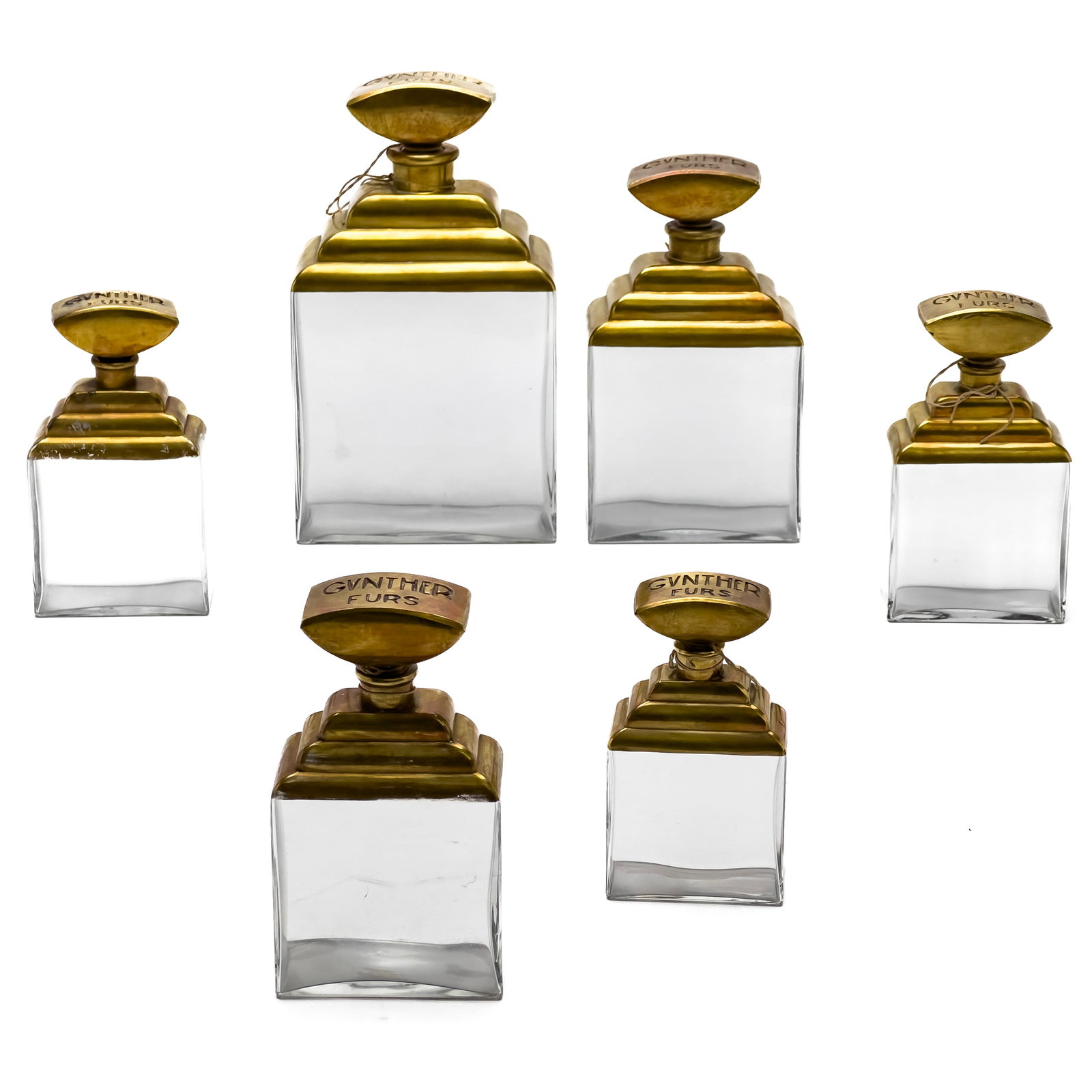 Gunther Furs Perfume Bottles, Group of 6: Lot 90 Gunther Furs Perfume Bottles, Group of 6 Group of 6 glass and metal bottles, each marked to top largest: 7 x 4 x 2 inches Provenance: The Estate of Ilon Specht