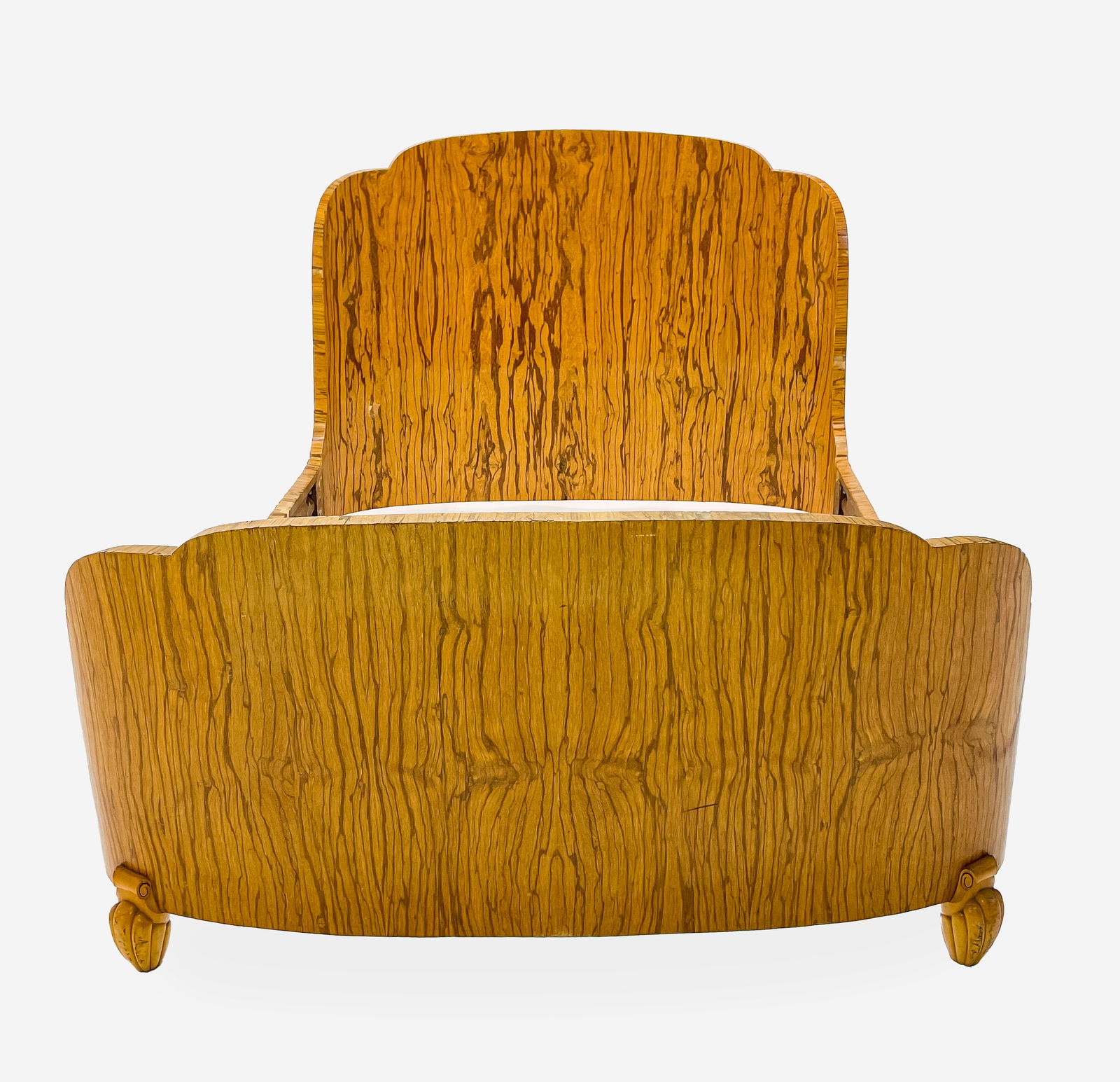 Art Deco Exotic Wood Veneer Bed: Lot 226 Art Deco Exotic Wood Veneer Bed curved form bed with fluted feet exterior: 57 x 79 inches, interior: 54 1/2 inches wide, longest length footboard to headboard about 73 inches, length at curve