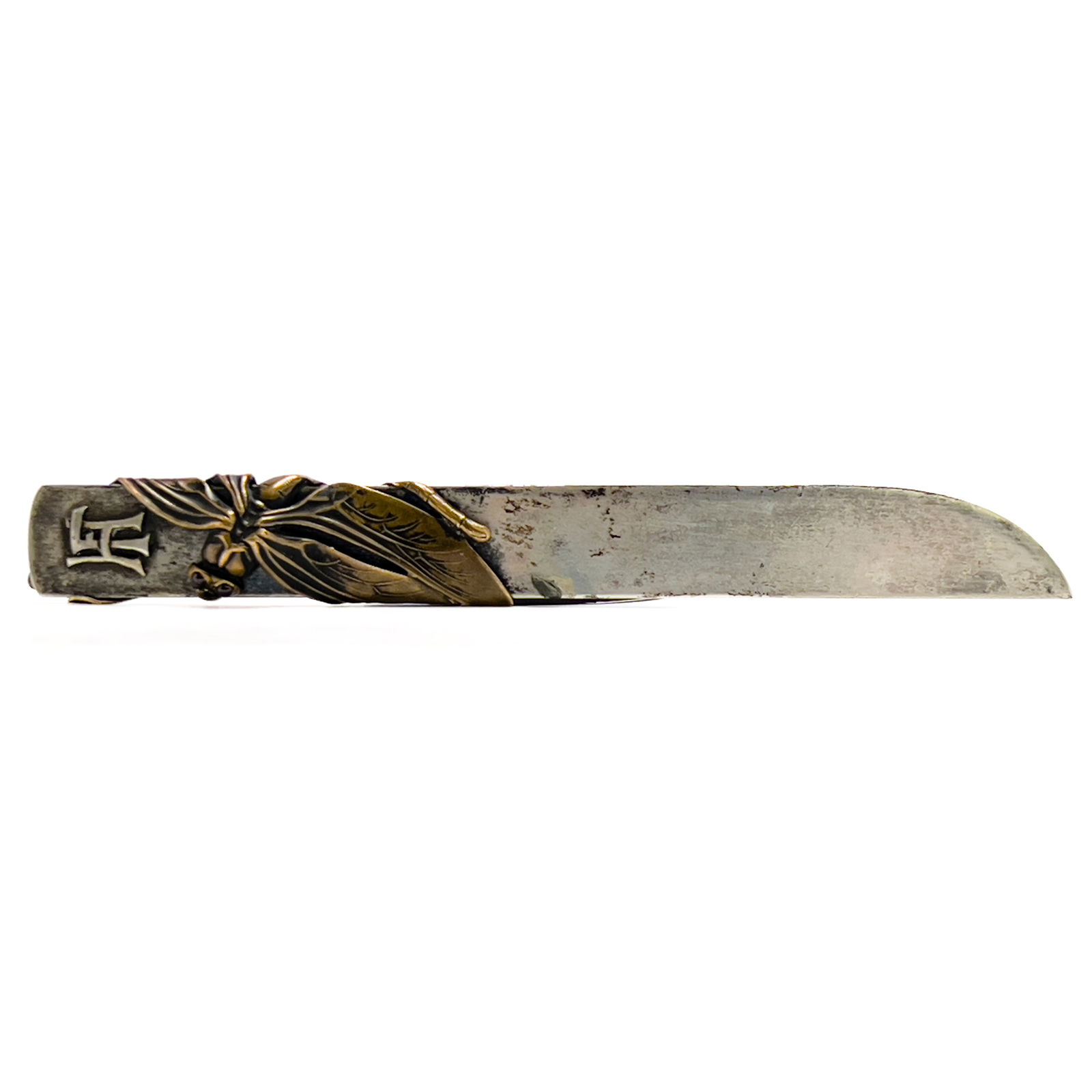 Art Nouveau Dragonfly Letter Opener: Lot 296 Art Nouveau Dragonfly Letter Opener bronze, silver Art nouveau letter opener having silver blade and a bronze dragonfly with garnet cabochon eyes wrapped around it and HF Monogram affixed to