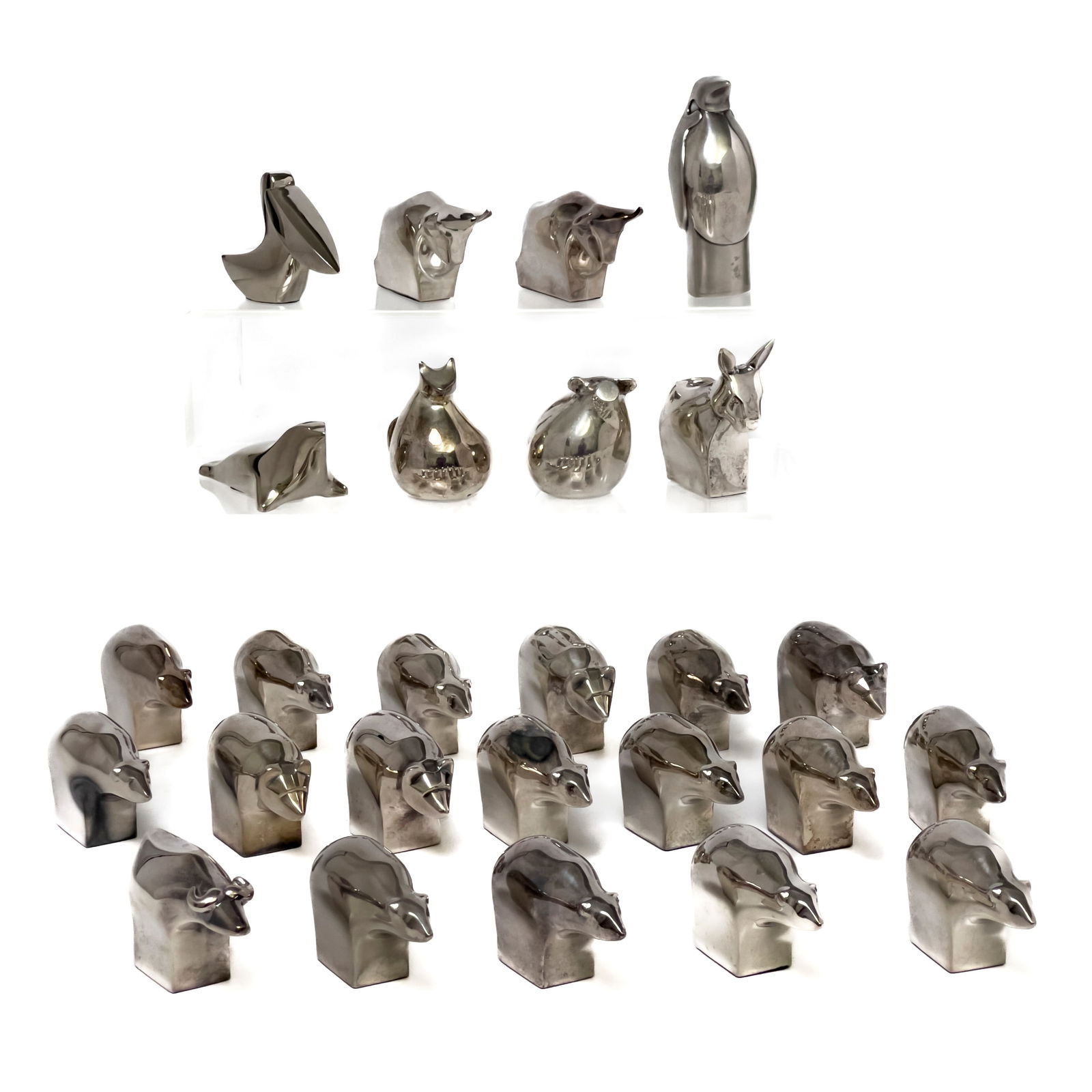 Dansk - Silverplate Animal Paperweights, Group of 26: Lot 304 Dansk Danish Manufacturer (Founded 1954) Silverplate Animal Paperweights, Group of 26 silverplate Comprising 26 paperweights of various animals, including bears, bulls, penguin, cat, rabbit, s