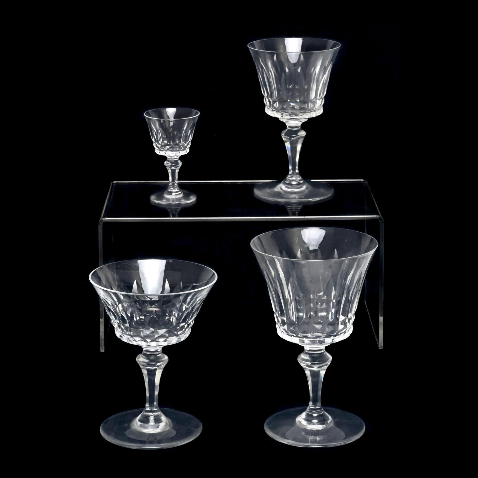 Baccarat - Balmoral Glassware, Group of 38: Lot 328 Baccarat French Manufacturer (est. 1764) Balmoral Glassware, Group of 38 glass Comprising 12 champagne coupes, 12 cordials, 8 red wine glasses, 6 white wine glasses 8 chipped glasses photograp