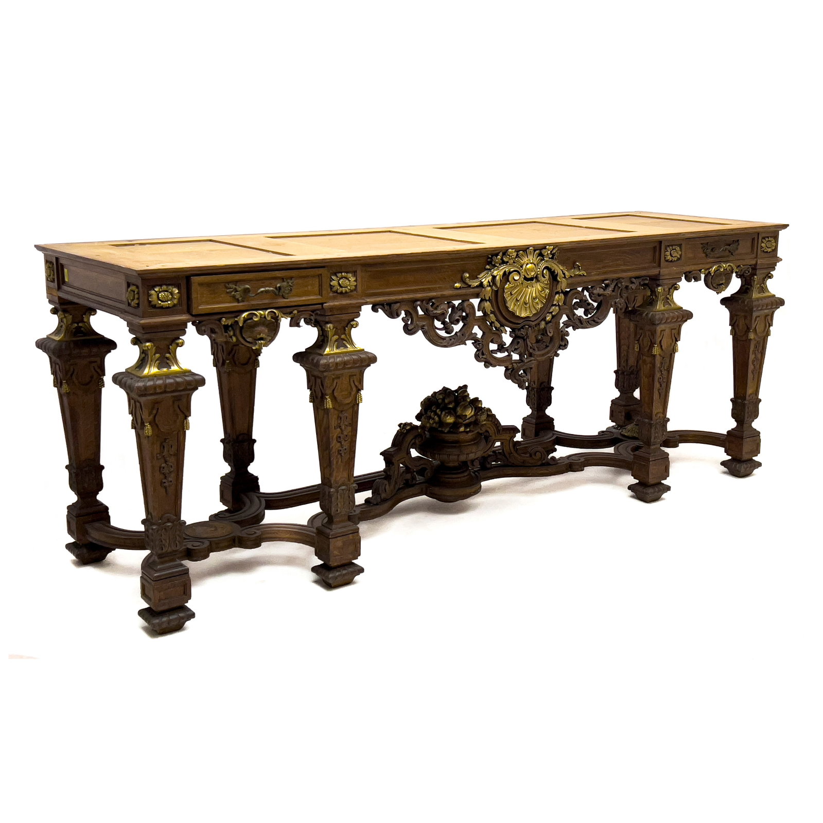 Louis XIV Style Carved Wood Console: Lot 416 Louis XIV Style Carved Wood Console wood, brass With brass ormolu and decorative carved apron, raised on eight tapered legs with carved decorative elements joined by stretchers 36 x 94 x 28 in