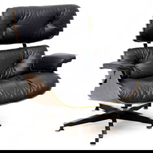 Charles and Ray Eames - Eames Lounge Chair: Lot 144 Charles and Ray Eames American (20th Century) Eames Lounge Chair molded rosewood plywood, leather, enameled aluminum, enameled steel, rubber Lounge chair model 670, designed by Charles and Ray