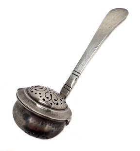 Georg Jensen - Sterling Silver Tea Strainer: Lot 202 Georg Jensen Danish (1866-1935) Sterling Silver Tea Strainer (c. 1930) sterling silver total approximate weight: 38 grams marked to handle length: 5 inches Provenance: The Estate of Peter Sich