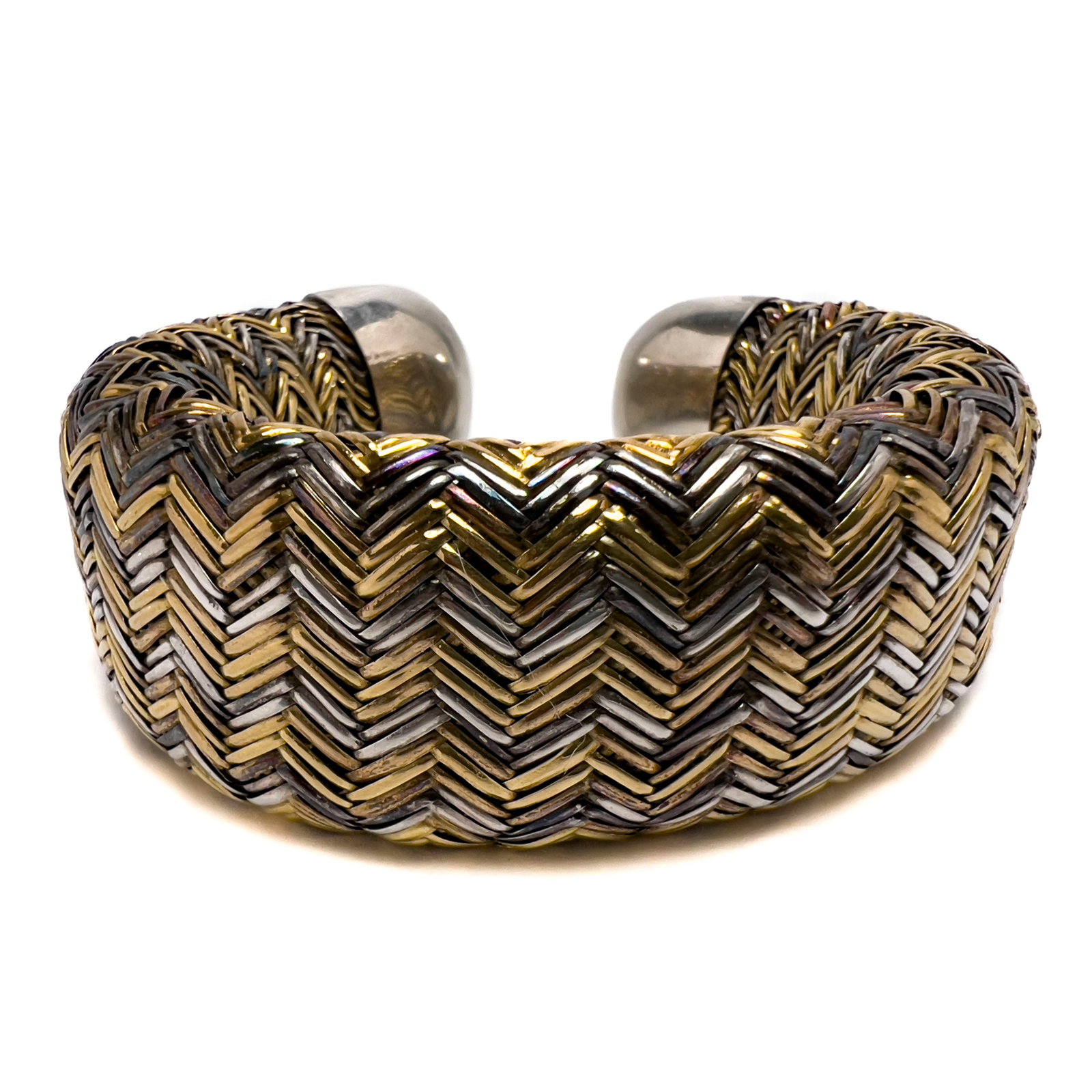 Angela Cummings - Silver and Gold Cuff Bracelet: Lot 309 Angela Cummings b. 1944 (Austrian-American) Silver and Gold Cuff Bracelet silver, gold Silver and gold bracelet cuff total approximate weight: 90.9 grams marked 3 1/4 x 2 3/4 inches Provenance