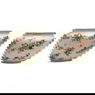 Floral Swirled Jardinieres, Pair: Lot 167  Floral Swirled Jardinieres, Pair porcelain Near pair of swirled jardinieres with all over floral pattern and gilt rim height (taller): 8 inches Provenance: The Estate of Nancy Sue Madden