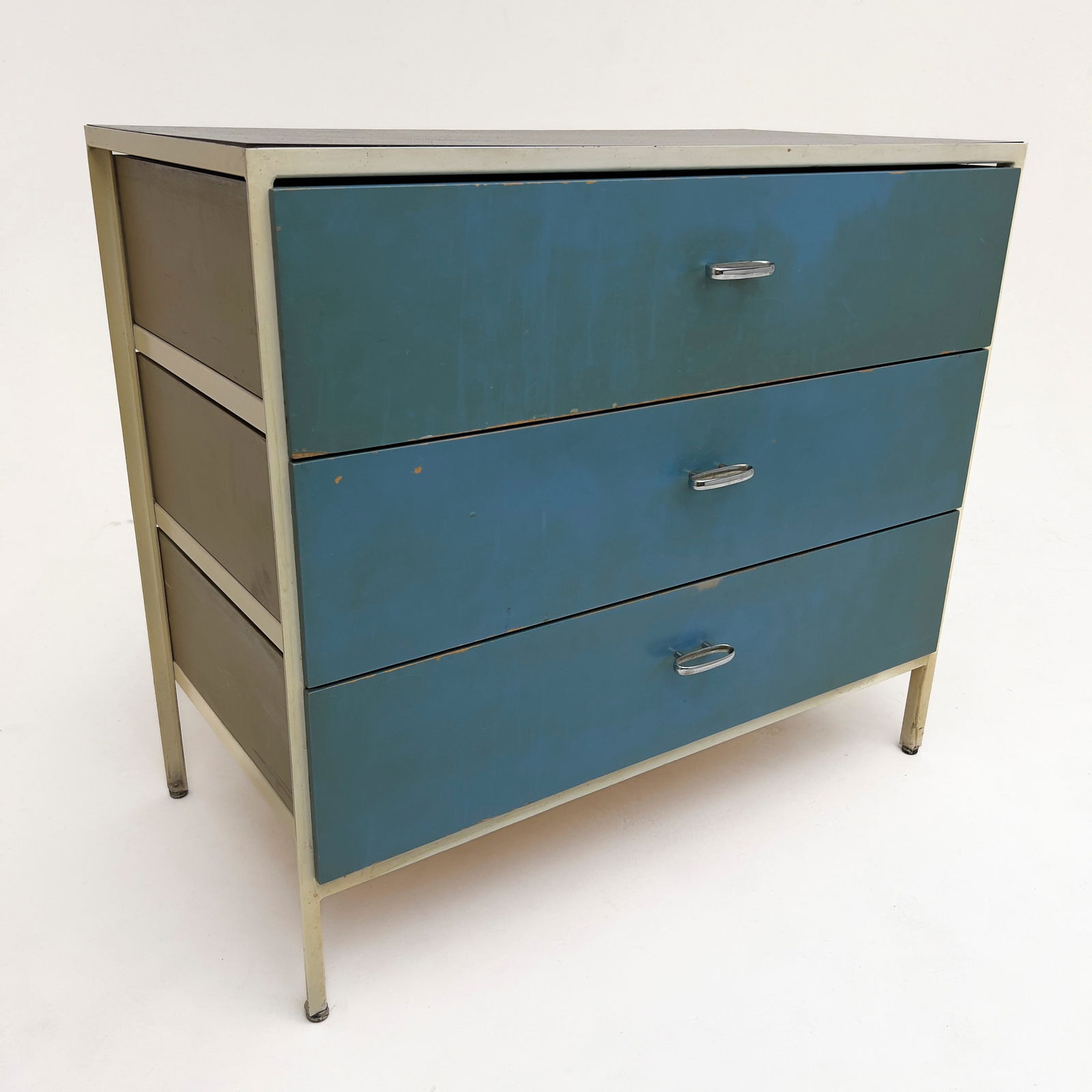 George Nelson - Steel Frame Cabinet for Herman Miller: Lot 149 George Nelson American (1908-1986) Steel Frame Cabinet for Herman Miller enameled steel, lacquered wood, chrome-plated brass pulls, laminate Comprising one steel frame cabinet Model 4013 with