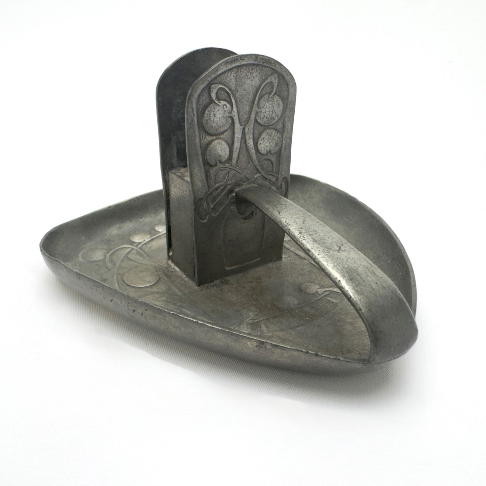 Archibald Knox - Tudric Cardholder for Liberty & Co.: Lot 73 Archibald Knox British (1864-1933) Tudric Cardholder for Liberty & Co. pewter manufacturer's stamp to bottom 3 x 5 x 5 inches Provenance: property from a Brooklyn Heights Estate