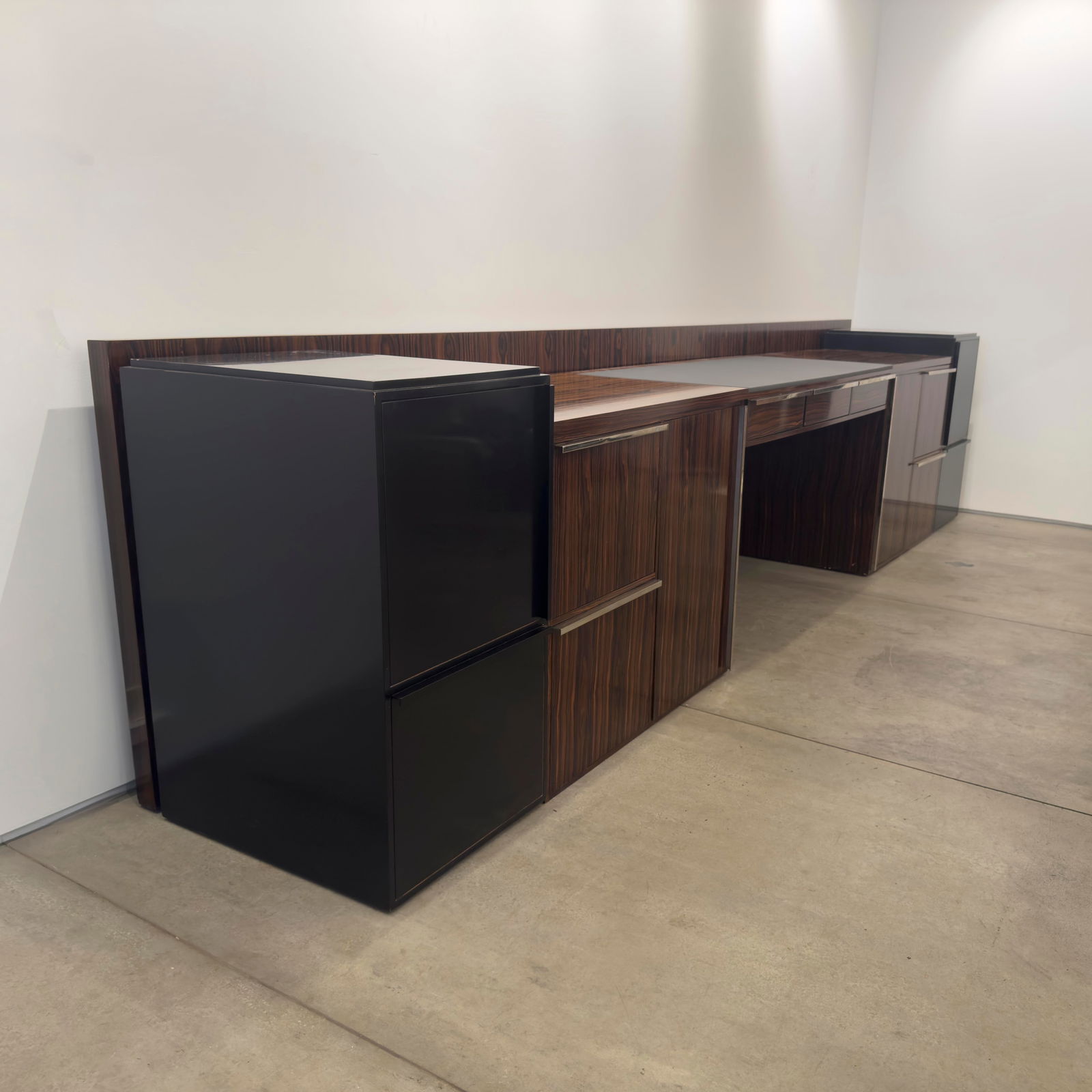 Kevin Cordes - Executive Rosewood Desk: Lot 170 Kevin Cordes American (1948-2023) Executive Rosewood Desk rosewood, metal, leather Executive desk in 8 pieces. 150 5/8 x 36 inches Provenance: From a Private Pennsylvania Collection