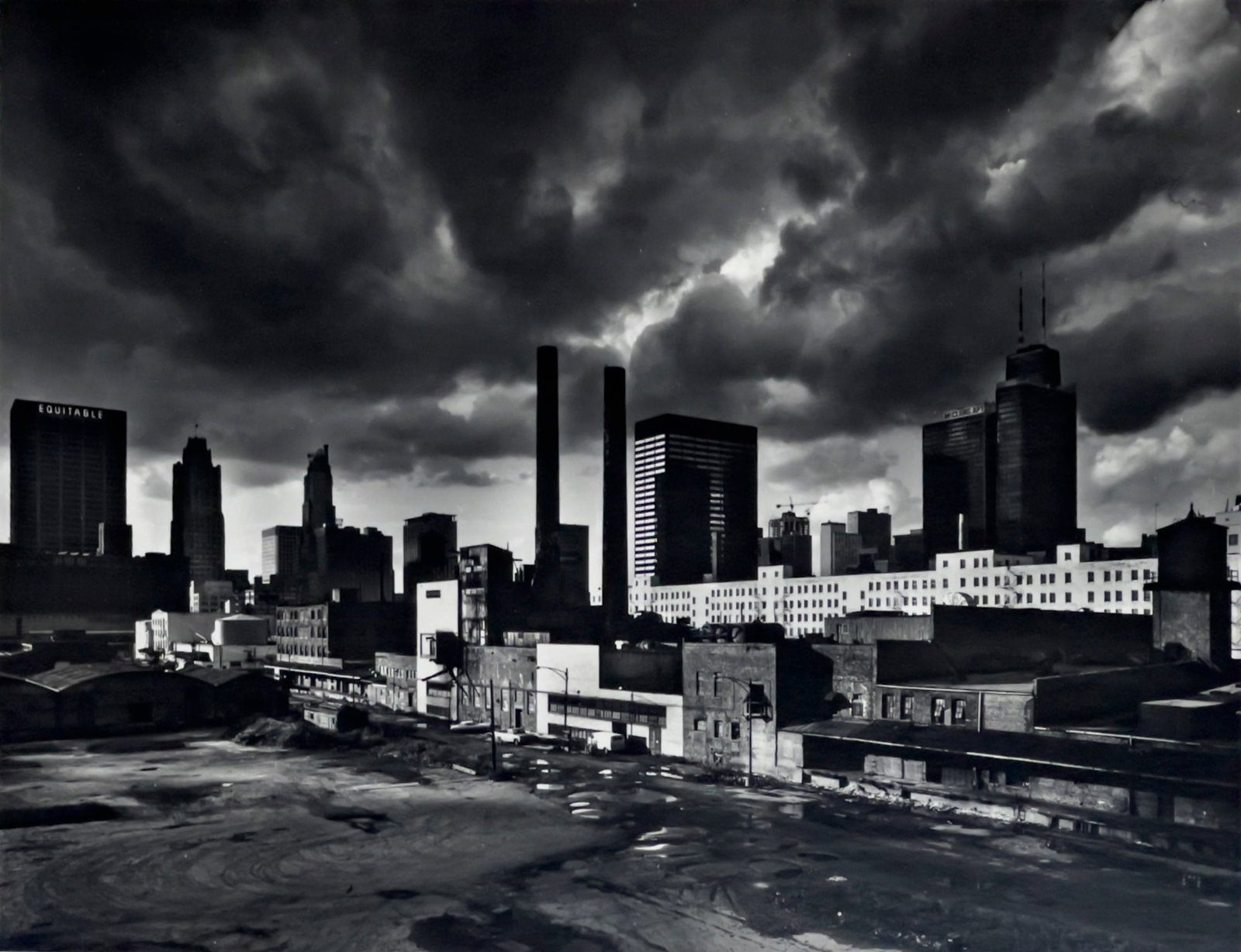 Jose Lopez/Louis Medina - Chicago with Equitable Building: Lot 9 Jose Lopez/Louis Medina - Chicago with Equitable Building (XX) silver gelatin print image: 6 3/4 x 8 3/4 inches sheet: 8 x 10 inches Provenance: From the Carol Lynn ”Cookie” Vasquez 