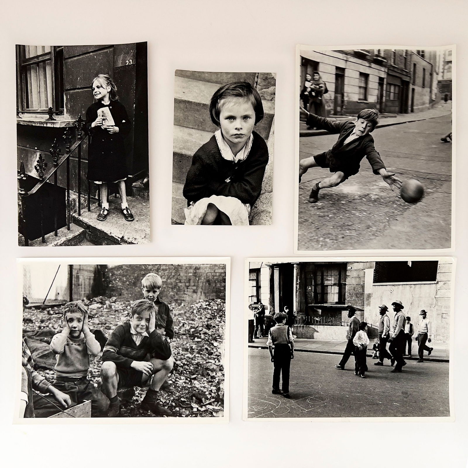 Roger Mayne - Post War Youth, Group of 5: Lot 104 Roger Mayne British (1929-2014) Post War Youth, Group of 5 press prints credit stamps verso largest: 8 x 10 1/2 inches unframed Provenance: The Eugene and Dorothy Prakapas Estate