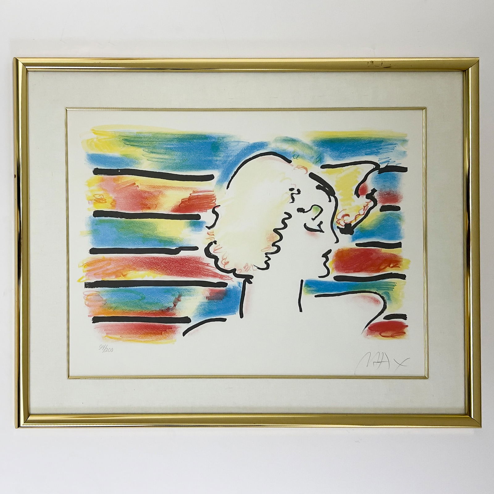 Peter Max - American Woman: Lot 247 Peter Max American (b. 1937) American Woman lithograph signed lower right, numbered 94/200 sight: 19 x 25 inches brass frame with silk slip with glazing, frame dimensions: 26 1/2 x 32 1/2 x 1