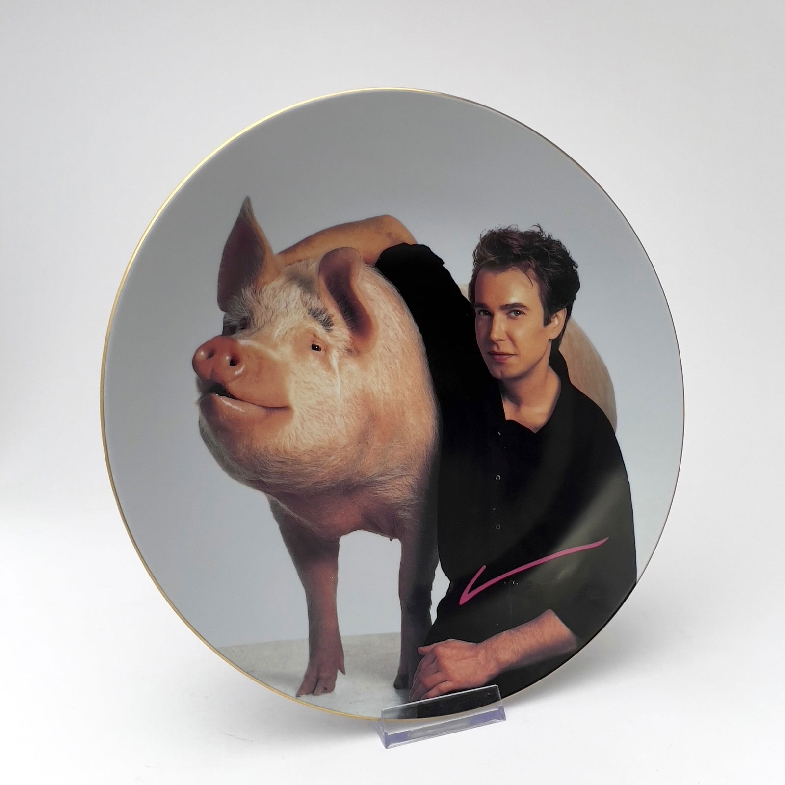 Jeff Koons - Signature Plate: Lot 164 Jeff Koons American (b.1955) Signature Plate porcelain numbered XXVI/L diameter: 10 7/8 inches Provenance: The Estate of Richard Flood, Writer, Curator, and Former Editor of Artforum