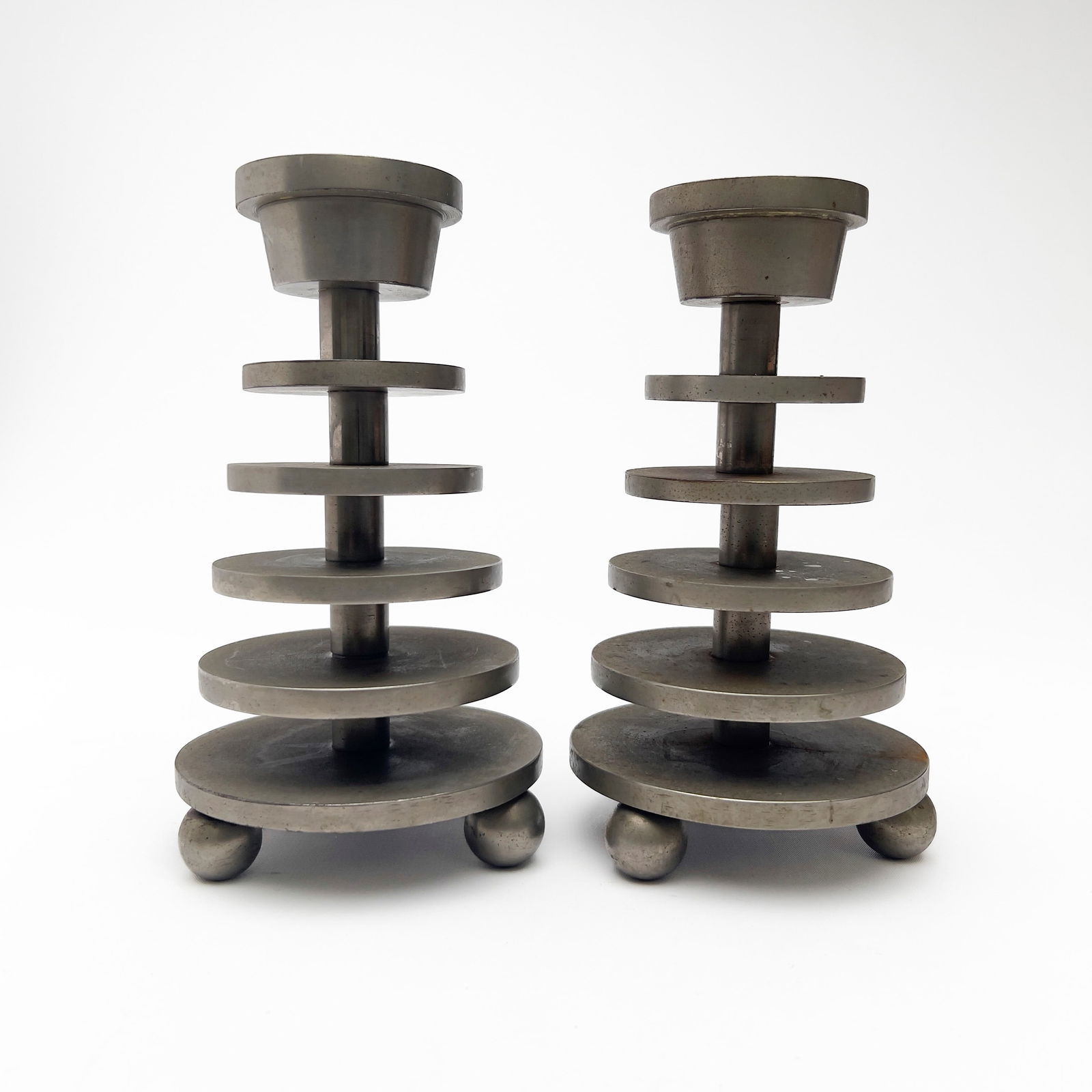 Machine Age German Candlesticks: Lot 170 Machine Age German Candlesticks (circa 1928) nickel-plated steel each: 7 3/8 x 4 1/4 x 4 1/4 inches Provenance: The Estate of Richard Flood, Writer, Curator, and Former Editor of Artforum pu