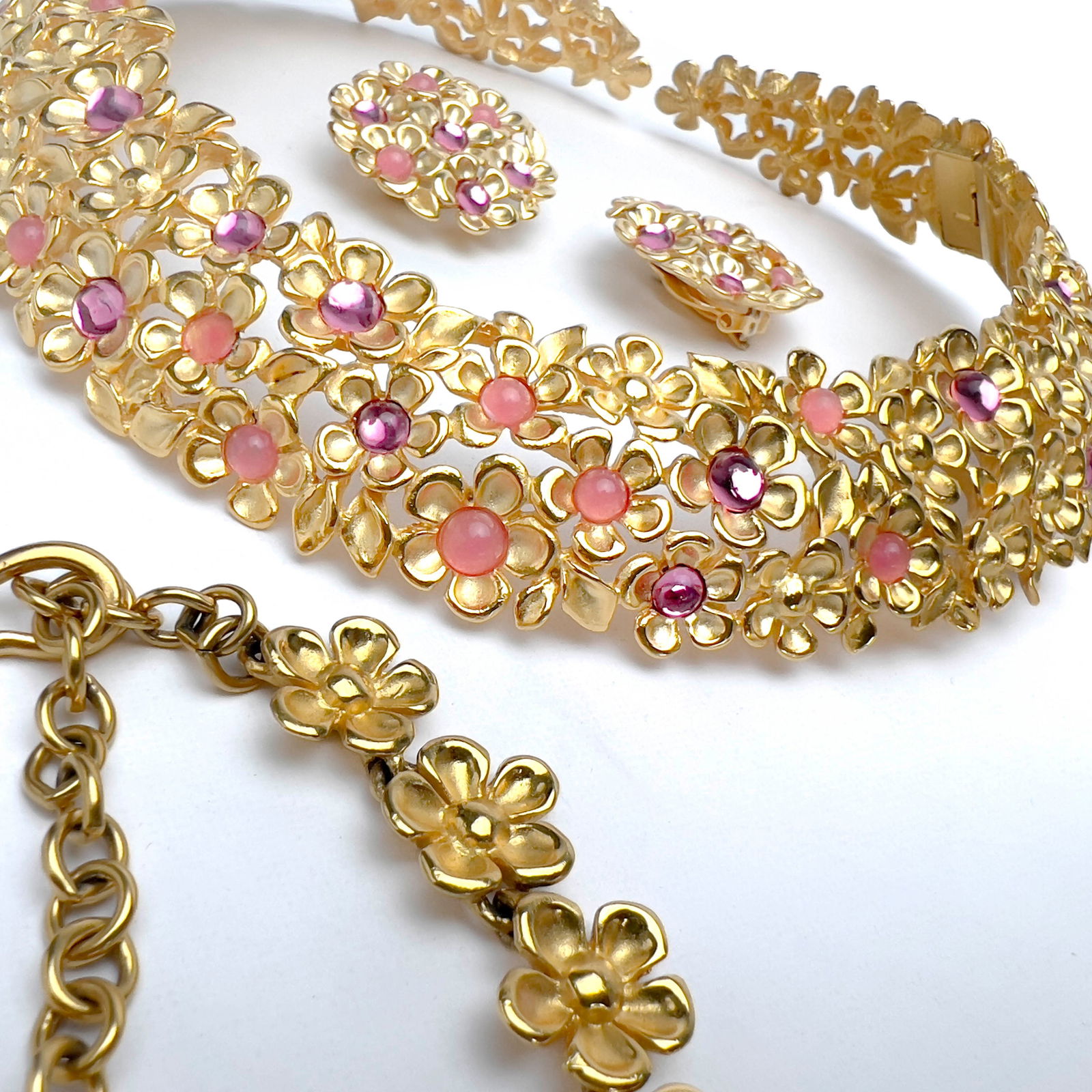 Chanel, Dior, Givenchy, Swarvoski , and Others - Designer Costume Jewelry: Lot 59 Chanel, Dior, Givenchy, Swarvoski , and Others - Designer Costume Jewelry Comprising a silver-tone Christian Dior collar with matching clip-on earrings set, one pair of gold-tone Yves Saint La