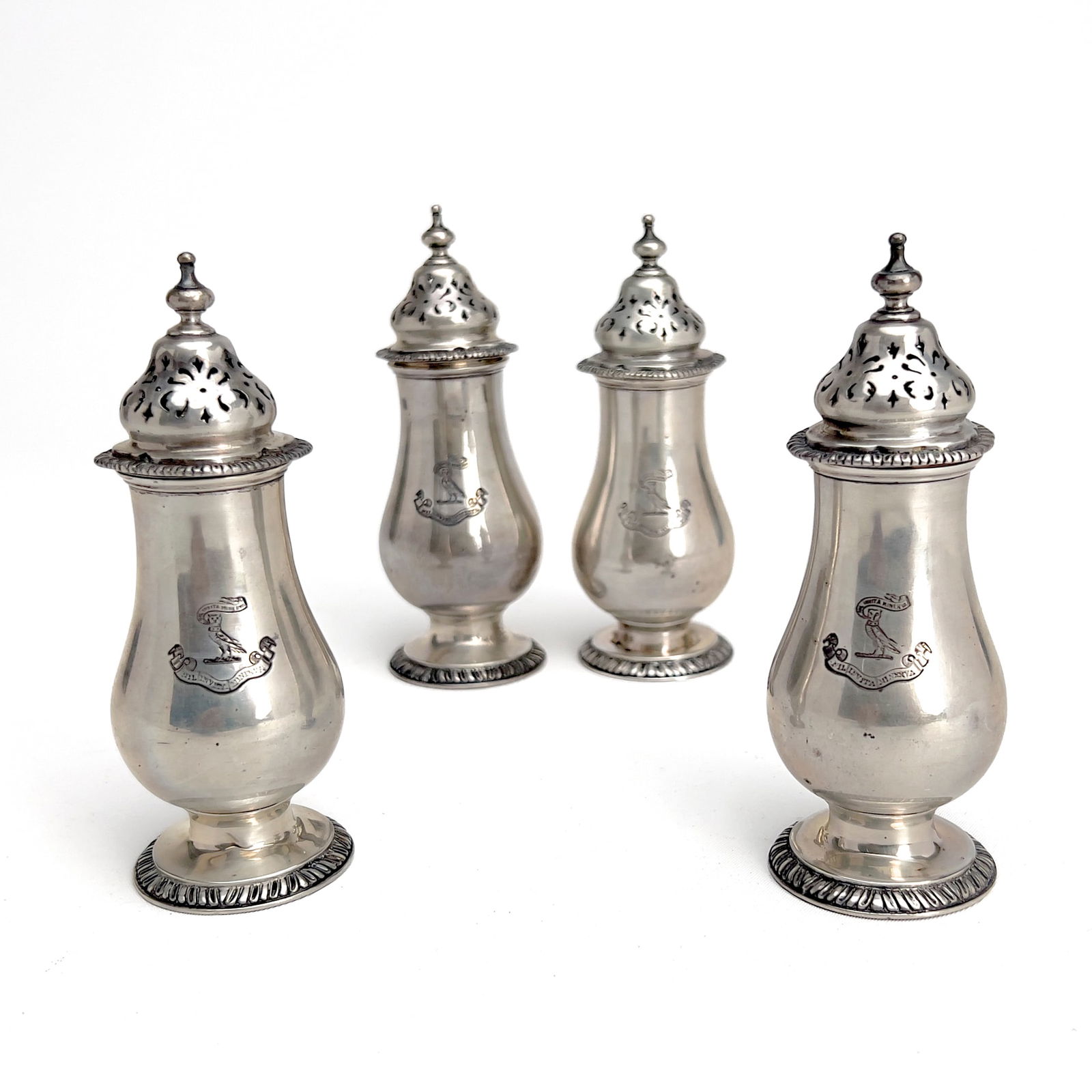Garrard - Four Silver Sugar Shakers: Lot 125 Garrard British manufacturer (founded 1735) Four Silver Sugar Shakers sterling silver Four pierced sterling silver shakers each decorated with an owl and scroll banner reading ”Nil