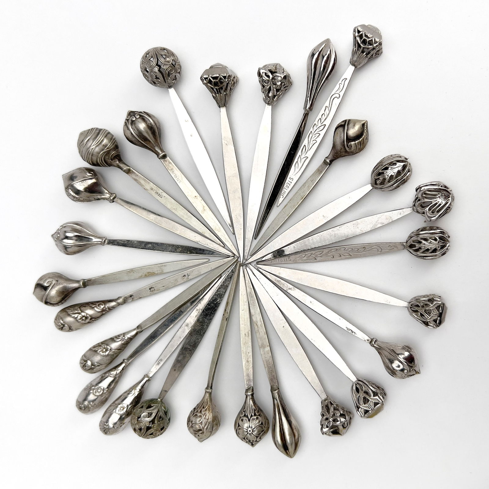 Silver Appetizer Picks, Group of 26: Lot 130 Silver Appetizer Picks, Group of 26 sterling Sterling silver group, total approximate weight: 121.3 grams each stamped length (each): 3 inches Provenance: From a Private Upper East