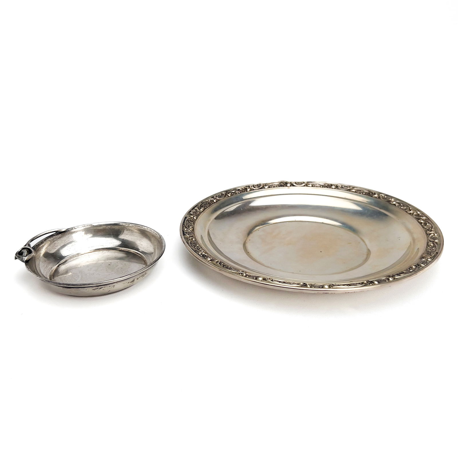 Gorham and Moss Two Silver Serving Dishes: Lot 139 Gorham and Moss Two Silver Serving Dishes sterling silver Sterling silver group, comprising of one sterling siver dish by Gorham, and one small sterling dish by Moss total approximate weight: