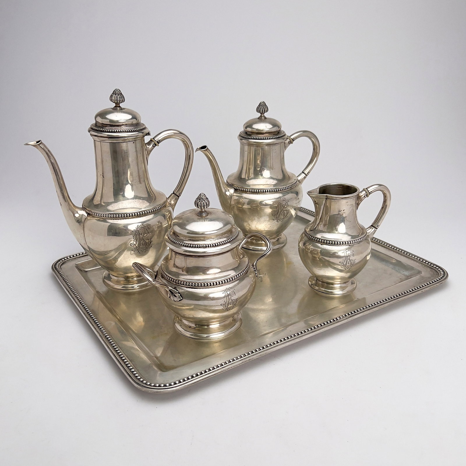 Wolfers Frères - Silver Coffee and Tea Service: Lot 161 Wolfers Frères Belgian manufacturer (est. 1812) Silver Coffee and Tea Service 830 Silver Silver hollowware coffee and tea service with coffee pot, tea pot, creamer and lidded sugar bowl