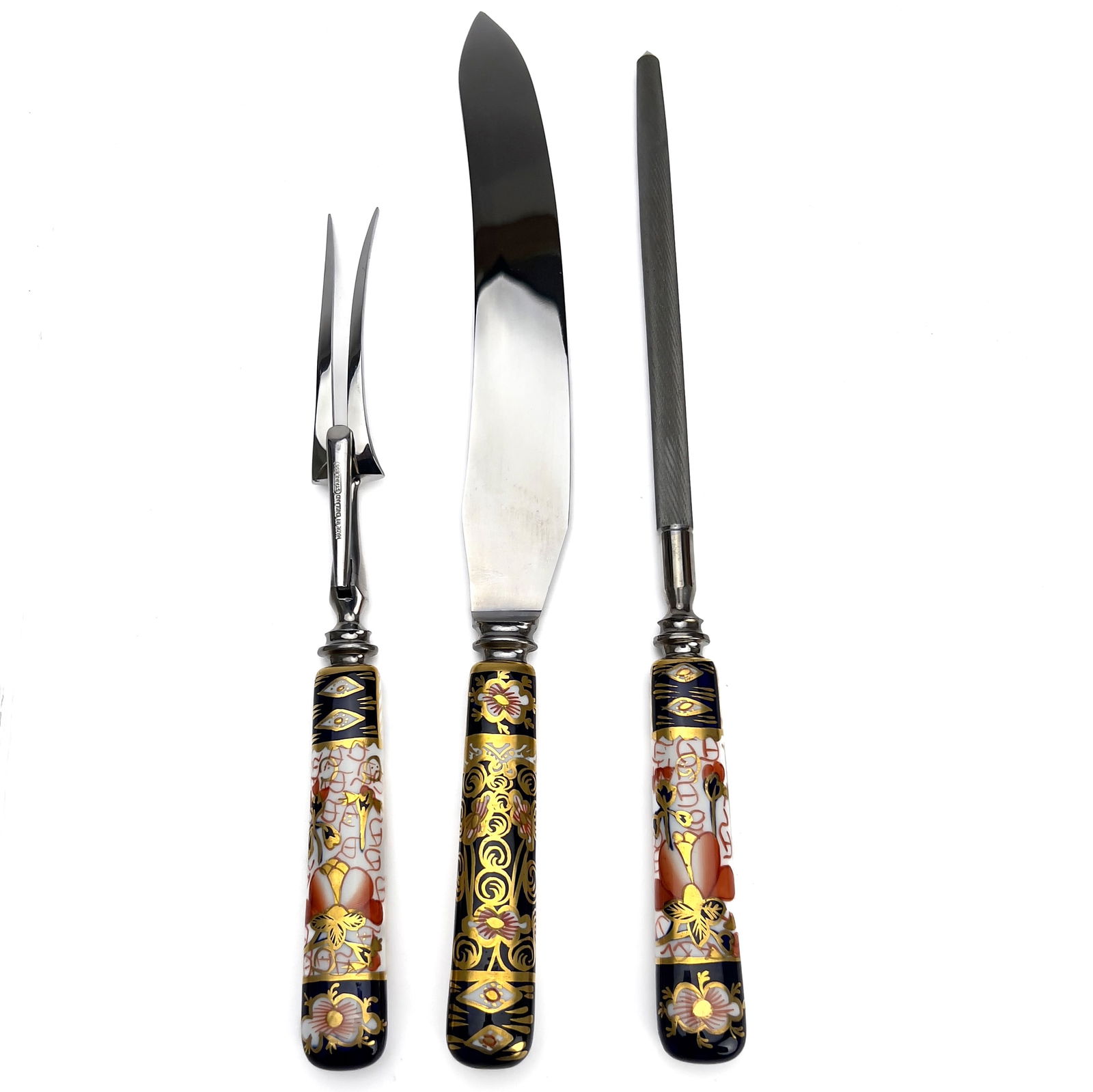 Royal Crown Derby - Imari Three-Piece Carving Set: Lot 171 Royal Crown Derby English (est. 1750) Imari Three-Piece Carving Set bone porcelain, stainless steel longest: 13 3/4 inches Provenance: From a Central Park West Estate