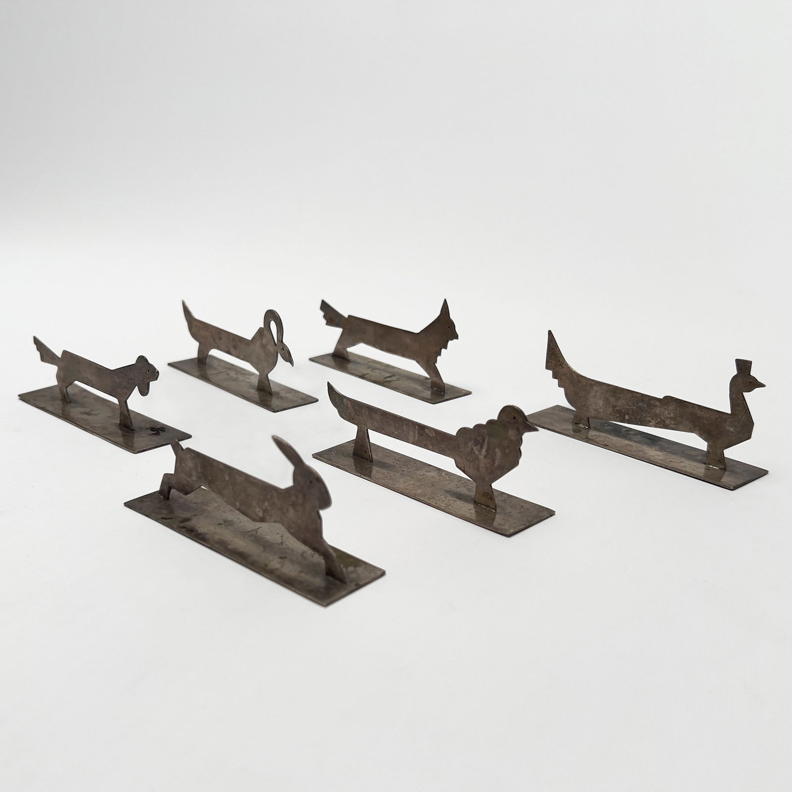 Art Deco Silverplate Animal Form Knife Rests: Lot 190 Art Deco Silverplate Animal Form Knife Rests silverplate Knife rests in animal forms, silverplate, with marks. Provenance: Property from a Brooklyn Heights Estate