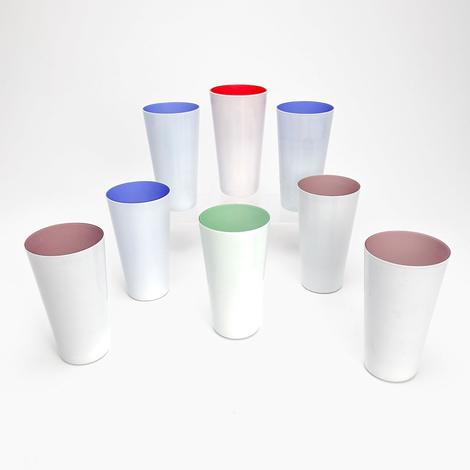 Murano Moretti Style Highball Glasses: Lot 206 Murano Moretti Style Highball Glasses glass 8 Highball glasses with white exterior and assorted pastel interior colors 5 3/4 x 3 1/8 inches Provenance: From a Central Park West Estate
