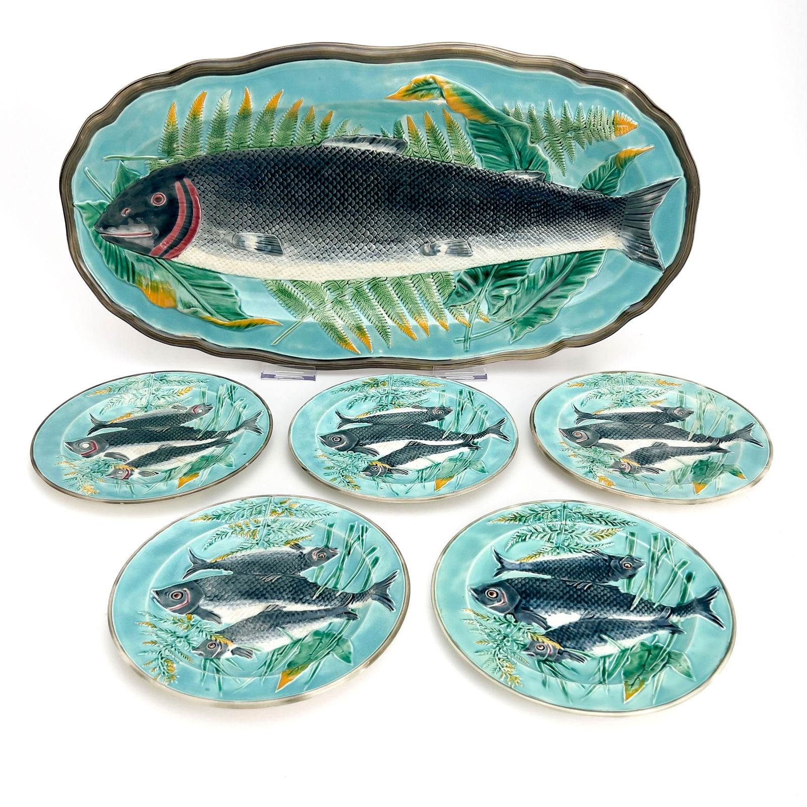 Wedgwood - Majolica Fish Service, Set of 7: Lot 216 Wedgwood English Manufacturer (Founded 1759) Majolica Fish Service, Set of 7 Wedgewood fish service comprising of one large platter with long scalloped oval form in polychrome tin glazes with