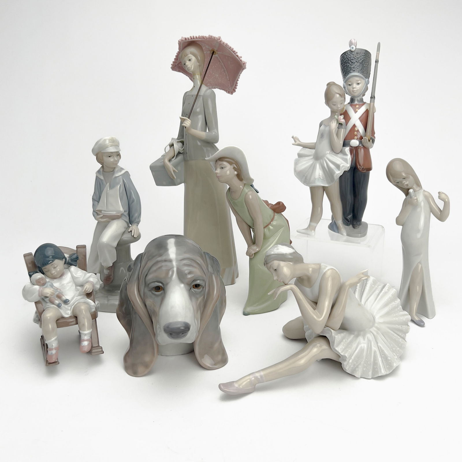 Lladro - Porcelain Figurines, Group of 8: Lot 238 Lladro Spanish Manufacturer (Est. 1953) Porcelain Figurines, Group of 8 porcelain stamps to underside height (tallest): 14 inches Provenance: The Estate of Carol L. Aerenson
