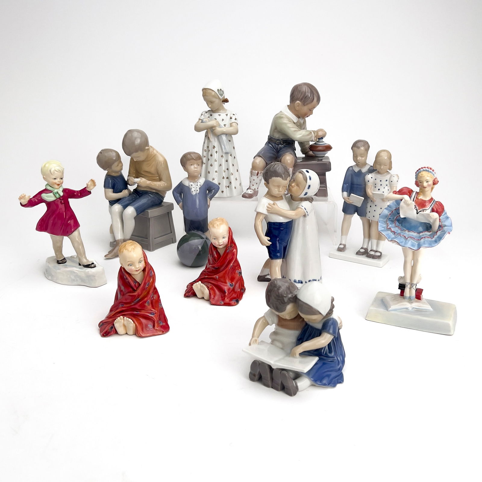 Bing & Grondahl, Royal Copengagen, Royal Doulton, & Others - Porcelain Figurines, Group of 11: Lot 241 Bing & Grondahl, Royal Copengagen, Royal Doulton, & Others - Porcelain Figurines, Group of 11 porcelain European figurine group, comprising of porcelain figurines stamped Bing & Grondahl, Dah