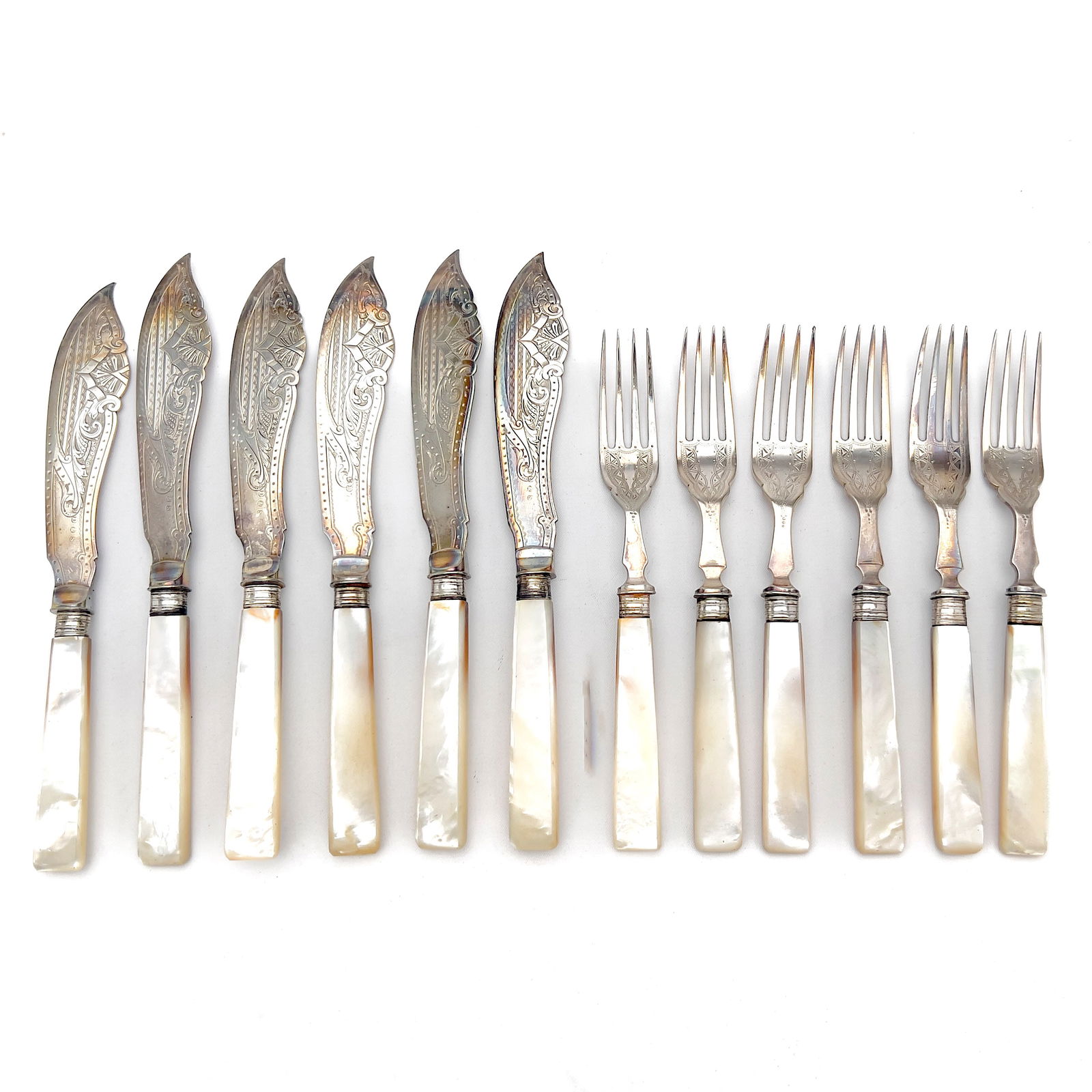 possibly Walker and Hall - Silverplate and Mother of Pearl Fish Service for Six: Lot 257 possibly Walker and Hall British manufacturer (1845-193) Silverplate and Mother of Pearl Fish Service for Six mother of pearl, silverplate Victorian fish service for Six, in a velvet lined