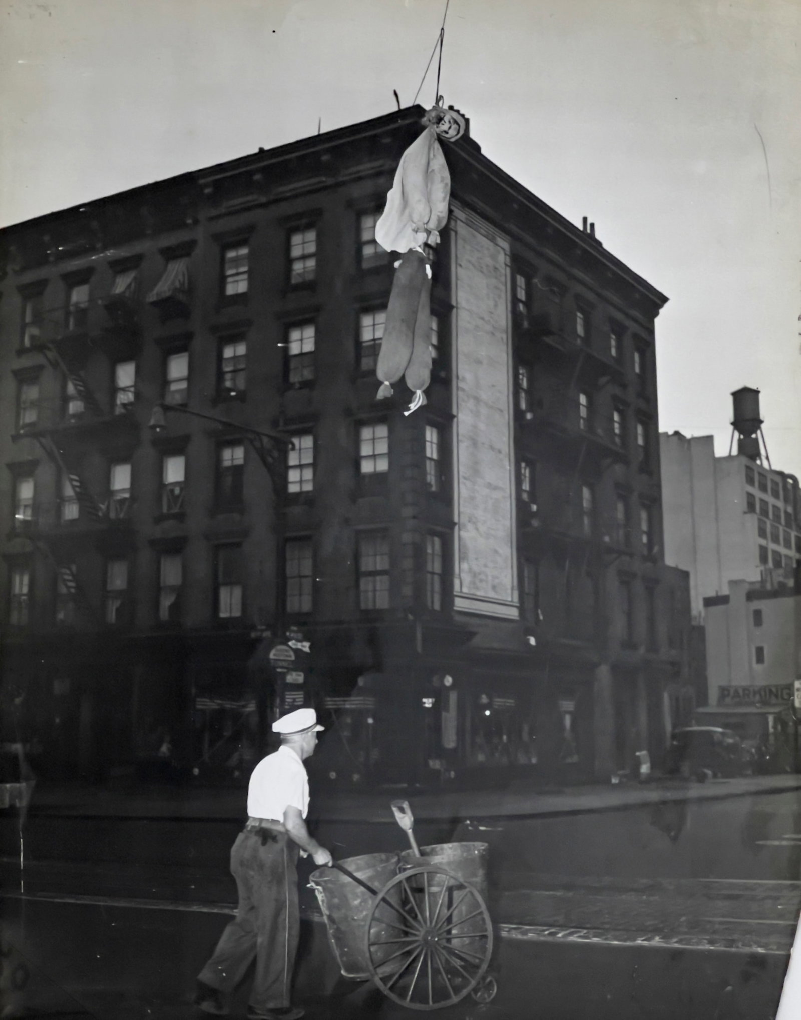 Weegee (Arthur Fellig) - Hitler Hung in Effigy, New York: Lot 136 Weegee (Arthur Fellig) American (1899-1968) Hitler Hung in Effigy, New York (1941, possibly printed later) silver gelatin print stamped verso sheet: 13 3/4 x 10 3/4 inches unframed 