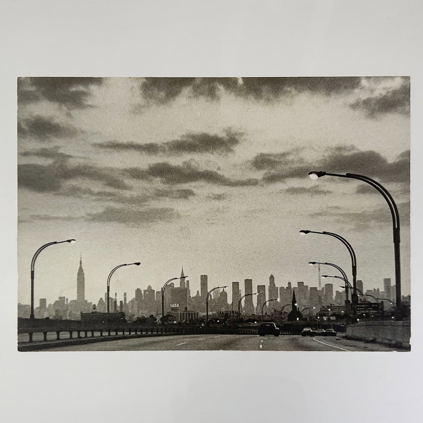 Lida Moser - Leaving JFK and going to Manhattan on the L.I.E.: Lot 154 Lida Moser American (1920-2014) Leaving JFK and going to Manhattan on the L.I.E. (1976) gelatin silver print signed and annotated verso 8 1/2 x 12 1/4 inches unframed Provenance: From a