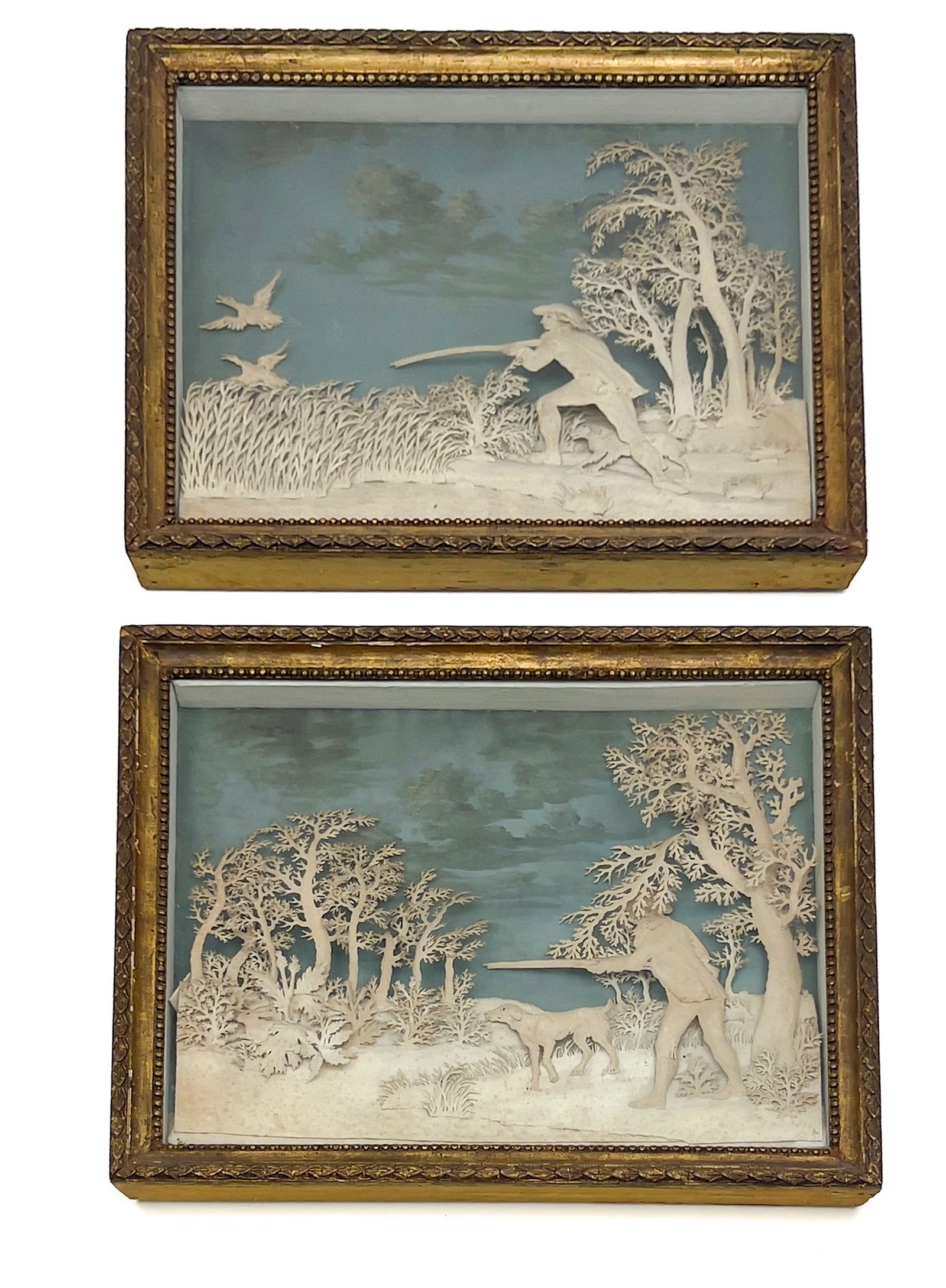 Two 19th Century Cut Paper Sporting Scene Dioramas: Lot 284 Two 19th Century Cut Paper Sporting Scene Dioramas paper sight (each): 12 x 15 inches Each in a wooden shadow box frame, dimensions: 14 1/4 x 17 1/4 x 1 3/4 inches Provenance: From the Collec